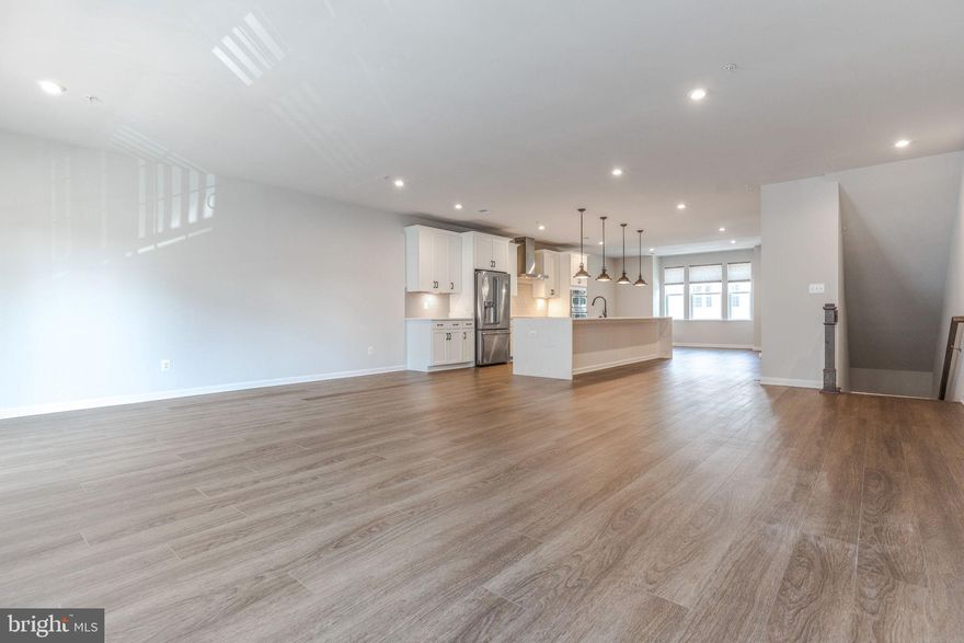 Receive $300 off the second month's rent with a signed lease and move-in during the month of September!* Welcome to this beautifully maintained three-bedroom, 2.5-bath townhouse condo located in the heart of Lanham. Situated in a sought-after community just minutes from NASA Goddard, this spacious home features an open-concept layout filled with natural light. The gourmet kitchen boasts granite countertops, stainless steel appliances, and ample cabinetry. The expansive owner's suite includes a walk-in closet and a private en-suite bathroom. Enjoy outdoor relaxation on your private deck. This property also includes a convenient rear-entry one-car garage, perfect for parking or additional storage. With a prime location, you’ll have quick access to I-495, Route 50, and the Metro, making it convenient to reach Washington, D.C., Baltimore, and Northern Virginia. Tot Lots/Playground, Jog/Walk Path