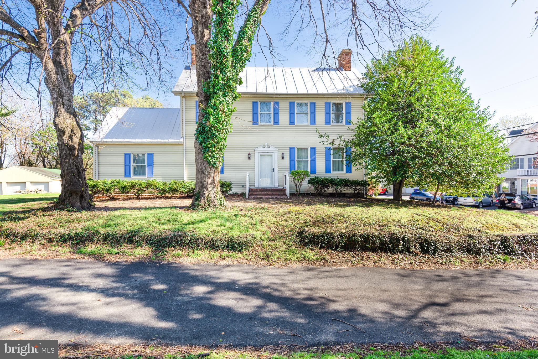 Historic 1856 Colonial with Modern Updates & Endless Charm. Step into the timeless elegance of this beautifully preserved 1856 Colonial home, thoughtfully renovated recently to blend historic charm with modern comforts. Nestled in the heart of quaint Queenstown, this stunning 5-bedroom, 2-bathroom residence offers a rare opportunity to own a piece of history with incredible versatility—zoned Town Center, making it perfect for a private residence, bed & breakfast, or Airbnb, or the opportunity to live where you work. Boasting three stories of character, this home features original architectural details, including four fireplaces—one in the master bedroom, dining room, living room, and kitchen—creating a warm and inviting atmosphere. The sunroom provides a tranquil retreat perfect for relaxing or entertaining.The home has been meticulously updated, including a newly sealed metal roof , new stainless steel appliances, and modern conveniences, all while maintaining its historic appeal. Enjoy easy access to Route 301, making travel a breeze, while being just moments from Queenstown Outlets, Queenstown Harbor Links, and the water. Town offers a beach , visitor boat dockage and boat and kayak launch as well. A truly one-of-a-kind property offering charm, history, and flexibility—don’t miss your chance to make this colonial gem your own! House has replaced windows with Anderson windows, upgraded the insulation and the property is not in a flood zone!! Seller is also offering a buyer home warranty for one year!