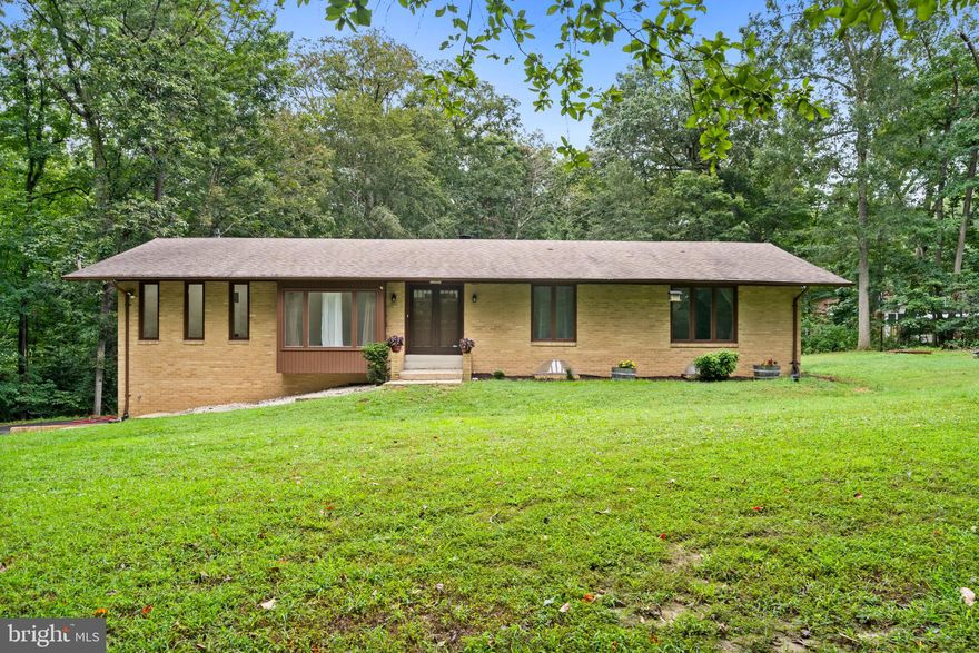 Peaceful Living with Modern Comforts! This spacious brick rambler with a full basement sits on a tranquil 1.5-acre lot—offering the perfect blend of privacy and convenience, with no HOA. Step inside to find a beautifully upgraded kitchen featuring granite countertops, stainless steel appliances, tile flooring, and a stylish backsplash. The main level boasts brand-new flooring, while the cozy gas fireplace creates a warm and inviting atmosphere.
Downstairs, the finished basement offers plenty of space for a game room, home gym, or your favorite hobbies. Enjoy the outdoors year-round from the oversized, screened-in back porch, or take a dip in your own private swimming pool—all surrounded by mature trees and peaceful views.
Additional highlights include:
•