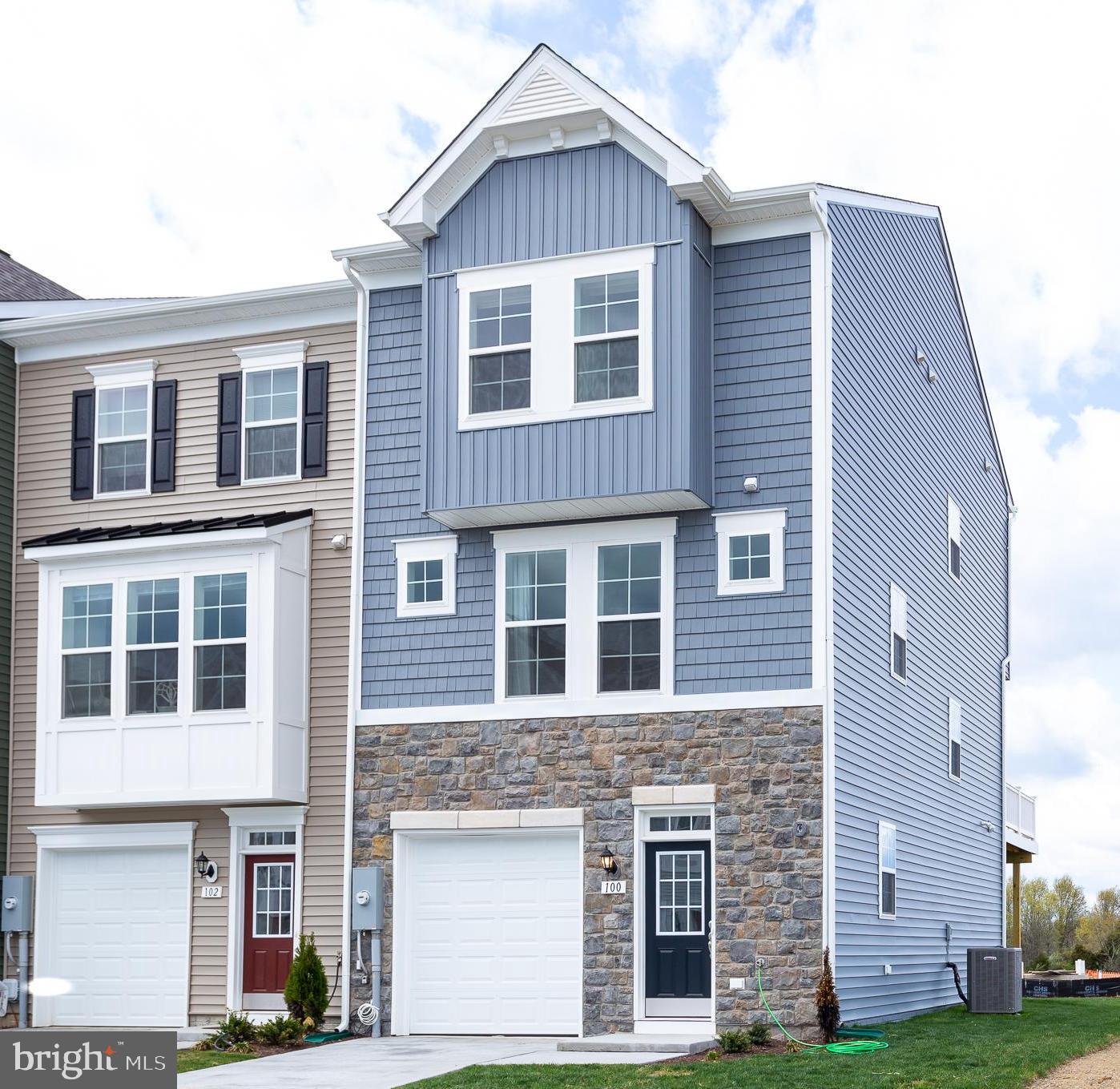 COMP Listing - The Darlington II, 3 level end unit townhome with 1 car garage featuring 3 Bedrooms and 3.5 Baths. The covered front porch leads directly through the front door into the spacious lower level including 9 ft. ceilings, foyer with a double coat closet, access to the garage continuing into the fully finished lower level recreation room with full bath and walkout access to rear yard with privacy fencing. This home features a 3 level morning room extension. Open concept main level with 9 ft. ceilings, luxury vinyl plank flooring throughout this level, dining room and kitchen with stainless appliances, large 8’ plus island, Level 3 soft close cabinets and drawers with the soft close feature, tiled backsplash stainless farmhouse sink, level 4 quartz countertops, that leads directly into living room with powder room. The primary suite includes a tray ceiling and large walk-in closet The primary bathroom has dual vanities with level 1 quartz, upgraded tiled shower and surround separate soaking tub. Laundry is located on the bedroom level. Home and community information, including pricing, included features, terms, conditions, availability and sales procedures related to appointments subject to change without notice. All images are for illustrative purposes only and individual homes, amenities, features, and views may differ. Images may be subject to copyright.