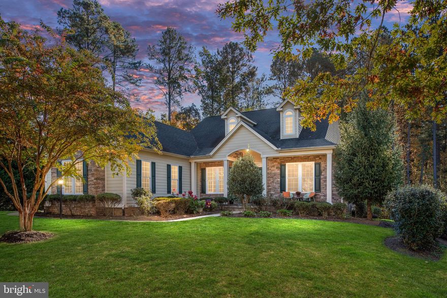 This gorgeous home features over 2,800 sq. ' of main level living with a formal dining room, study, 3 bedrooms , 2 and 1/2 baths, laundry  and a great open concept which includes a great room, kitchen and eating area all in one.  Lets not forget the beautiful sunroom and all of this in a sprawling ranch style home.  You will never have to go down to the huge open walk-out basement if you don't want too?  However, if you decide to head down stairs you will find a huge rec room, den, bedroom and full bath.  This home offers so much unfinished storage that you will not have to get rid of anything when you move in.   Enjoy sitting outside on your lovely front porch; grilling on the back deck right off of the sunroom, as well as the patio off the back down stairs going right into your fansatic rec room in the basement.   So I'm sure by now you have figured out this lovely home not only has ample interior living space but for those of us that love the outside this home offers ample outside living area as well.   All of this in the wonderful resort style living of Fawn Lake!  As if the community isn't enough this home sits on a queit cut-d-sac lot backing to trees for even greater privacy and peace.   The eat-in Gourmet Kitchen offers granite counters,  stainless steel appliances, double ovens, cook-top and a large island.  While at your kitchen sink you will find the view of the breathtaking stone floor to ceiling fireplace mesmerizing;  whether its the cold winter nights which will be coming soon or the holidays which are right around the corner you will enjoy the warm of this gorgeous feature for sure.  No detailed was spared when planning this home with the chair railing, crown moldings, recessed lighting, skylights, window treatments, atrium/french doors and windows.  Outside the lawn sprinkler system is already in along with beautiful landscaping that all you have to do is bring your personal things and enjoy.  Don't miss out.