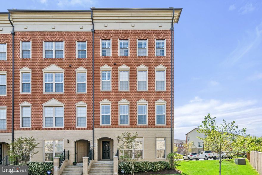 Welcome to this bright, spacious ground level end unit condo in sought after Madison Crescent.  The first level offers true open concept living and is the perfect space for entertaining with its living room, dining area and a beautiful gourmet kitchen with granite countertops, large island with space for barstools, stainless steel appliances ,  gas-cooking and a walk-in pantry.   You will find wood flooring throughout this level and an extra window on the side for additional light. There is also a powder room and access to the rear-load garage. The second level features a spacious owner's suite with a nice-sized walk-in closet and a bathroom with a separate shower, soaking tub and double vanity.  There is a second bedroom and a family room on this level, both provide access to the rear balcony.  The family room is the perfect space for a home office and could easily be converted into a third bedroom, if needed, as it has a closet. Low maintenance LVP flooring on the stairs, hallway and family room was recently installed. A full bathroom with a tub/shower and a laundry room, complete with washer and dryer, rounds out this level.  The wonderful location offers easy access to Rt 29 and Rt 15 for access to I-66 for commuters and is close to Wegmans, shopping centers, a myriad of restaurants and a movie theater.  Within the community you'll find an outdoor pool, playground and basketball courts.