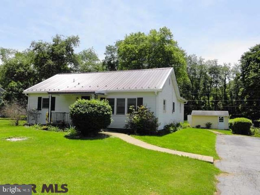 Affordable living! This adorable home is located near Spring Creek Park and also backs up to PSU Land with plenty of deer to watch. If you want local outdoor recreation and still close to town, schedule an appointment today! New metal roof installed in 2013. Owner completed family room addition and screened porch in 1994. Also includes gas burner which heats entire home, and a 10x16 shed. Possibly a short sale.