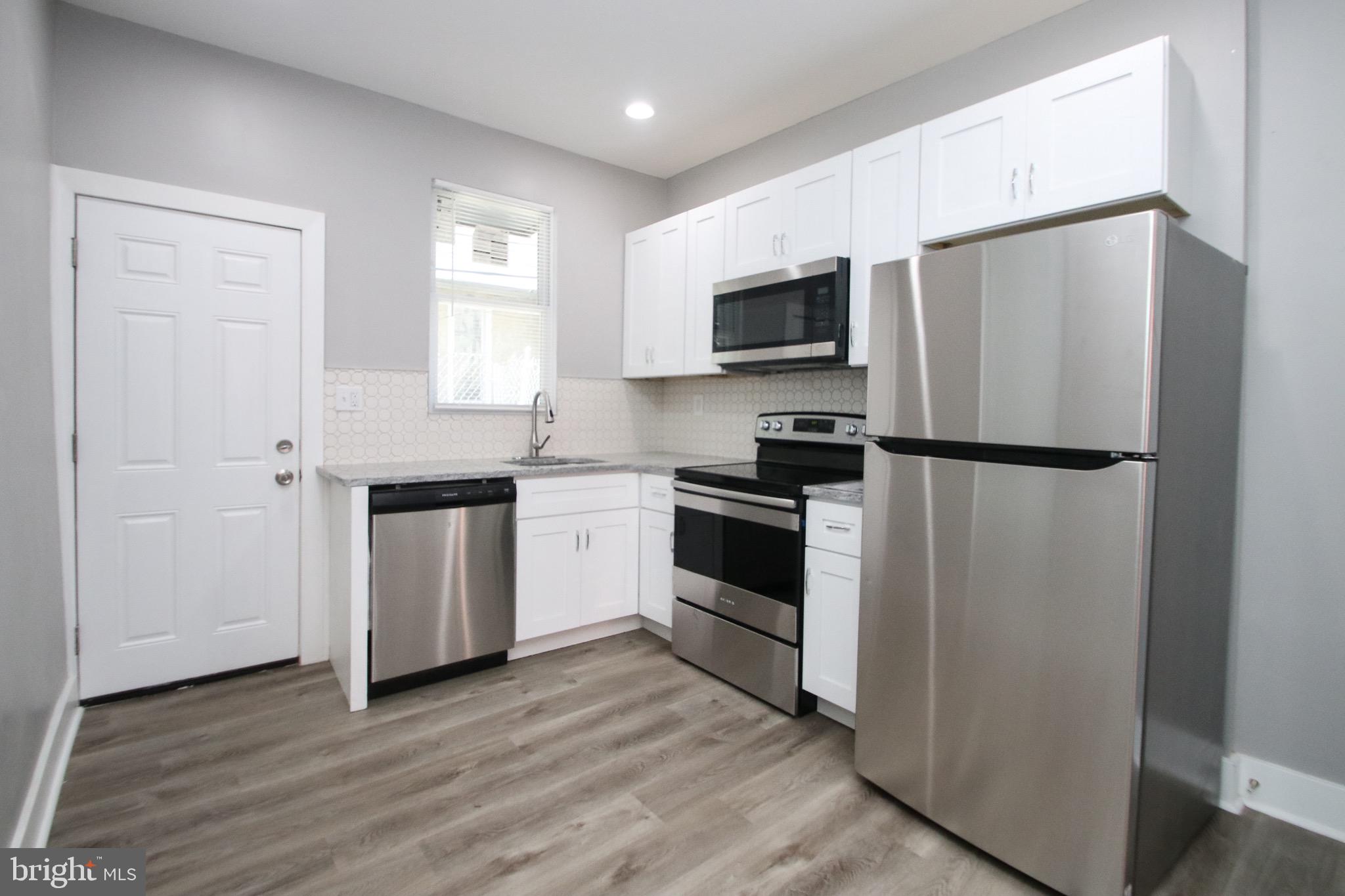 This is the one you've been waiting for! A wonderful opportunity to own a stylish modern home that offers a fully remodeled space from top to bottom! Located in one of the city’s hottest and fastest-growing neighborhoods. This house offers a beautiful and bright interior and includes all the best features you would expect from a superior renovation- new flooring throughout, brand-new appliances, brand new split HVAC system and water heater, new electric and plumbing systems, new windows and so much more. A smart design and great attention to detail are prominently on display! Once you step through the front door, you'll immediately be greeted by a spacious space that extends from the living room through the open concept kitchen, adding warmth to the contemporary interior and luxurious floors. The kitchen was designed to fulfill all a cook’s needs- luxurious stainless-steel appliance package, spacious granite stone countertops and designer modern cabinetry. You'll love the amount of natural light that pours in through the large windows.
This property is truly move-in ready, upstairs are three large bedrooms boasting modern floors and beautiful ceiling height. On this floor you will also find a spacious modern bathroom with magnificent vanity and tiled floors. The large backyard is fenced and has plenty of room for entertaining or just relaxing in privacy. This home is truly full of luxury! Excellent location in a quiet block in the heart of Strawberry Mansion/ Brewerytown. This address allows for easy commuting across the Schuylkill River. Within minutes, you will be in the major medical centers of PENN, CHOP, and HUP. If driving to Drexel or UPENN universities or the suburbs and towns off the 676. The neighborhood offers cool and eclectic eateries, grocery shops, local bars, and green parks. Also, a quick ride to Rittenhouse Square, Midtown, Fairmount, the Schuylkill trail, and many of Center City Philadelphia best attractions. This property qualifies for a 10K Grant through the Majority-Minority Census Grant offered by Prosperity Home Mortgage, which can be used for closing costs, rate buy-down, and more. It is fully forgivable to all buyers, not just first-time buyers. Reach out for more information. Don’t miss this amazing opportunity to own this home. Schedule your visit today!
