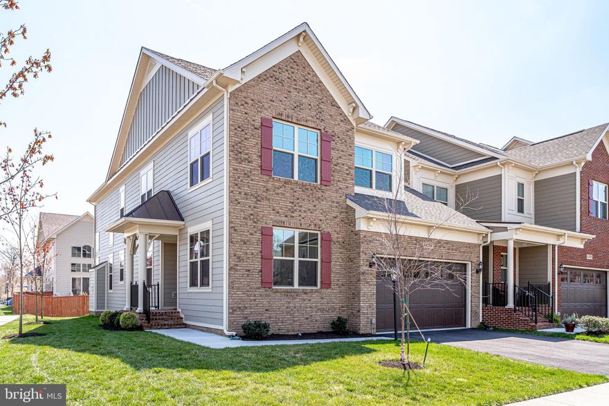 Like new! Over 55+ active adult community at The Vistas at Lansdowne! Fabulous 3BR/3.5BA end-unit! Hardwood floors throughout main level! Formal dining room! Fabulous kitchen with granite countertops, large island and the convenience of two wall ovens, gas cooktop, stainless steel appliances and plenty of storage! Magnificent light-filled two-story family room with dramatic soaring ceiling, gas fireplace and custom window shades! Main level owner's suite with tray ceiling, spacious ensuite luxury bathroom with his/her sinks and walk-in shower! Upper level loft area overlooking the family room! Two spacious bedrooms on the upper level have carpet for your comfort! A full bathroom on the upper level is conveniently located for the upper level bedrooms! The huge lower level basement is finished and has exterior access via walk-up stairs, a potential 4th BR & a 3rd full bath! Plenty of storage space in the basement too! The Vistas at Lansdowne location is convenient to Rt. 7, 267/28 and approximately 10 miles from Dulles International airport. Abundant shopping and restaurants are close by. Close to popular One Loudoun. A short distance to Historic Leesburg, Wegmans, Target, Costco, Leesburg Outlet Mall, Lowes, Home Depot and more! Inova Loudoun Hospital is just around the corner. The Vistas is located adjacent to the Lansdowne Woods condo community which provides access to all of the spectacular amenities: indoor pool, exercise facilities, meeting rooms, restaurant, hobby rooms, etc. Additionally, The Vistas is also adjacent to the Lansdowne Resort and Spa and golf course. Call today for your private showing!