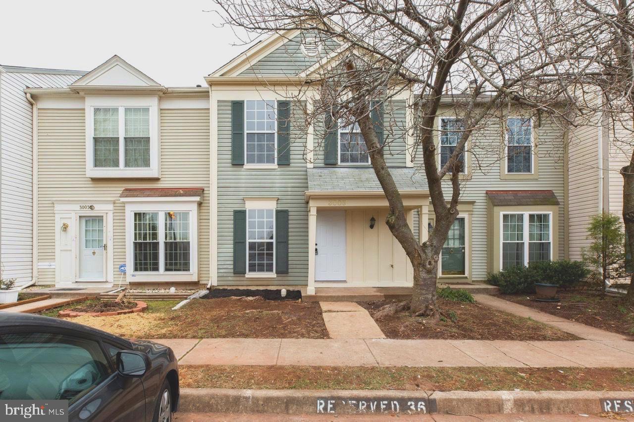 Fantastic rental opportunity in commuters DREAM location! Full interior upgrade... Updates include fresh paint, new carpeting, all new appliances including HVAC, water-heater, kitchen appliances and washer/dryer. Newer windows promise to save you tons of $$ on heating! A charming front porch greets you into this fabulous townhouse, offering 2 bedrooms, 1 full and 1 half bathroom. Over 1,000 square ft. includes main-level open floor plan with updated kitchen that flows into the family room. A charming fireplace and sliders to the private yard make this the perfect place for entertaining, no matter the season! Upstairs, two bedrooms share a full bath. TWO reserved parking spots! This won't last long, don't miss out!