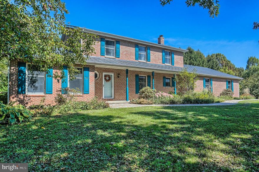 Privacy, View and Room to Breathe! On 2.24 Acres yet only minutes from town, this home has something for everyone. Come home to a tree lined driveway and welcoming front porch. A First Floor bedroom offers a full bath. The upstairs Master Bedroom has a connected bath, plus a huge walk-in closet. Spacious, sun filled bedrooms 3 & 4 share a view that goes on forever. Bright, open kitchen perfect for entertaining with dining area. Cozy Living room. A mudroom/pantry room and first floor laundry room make life easy and convenient. 2 car Garage. Full basement with tons of potential. New Roof. Fenced back yard. As the crisp fall air settles in  Set up your Adirondack chairs, grab a blanket and enjoy roasting marshmallows and crackling fires on the new outdoor patio and fire area. Life will be grand at this home!  See it today