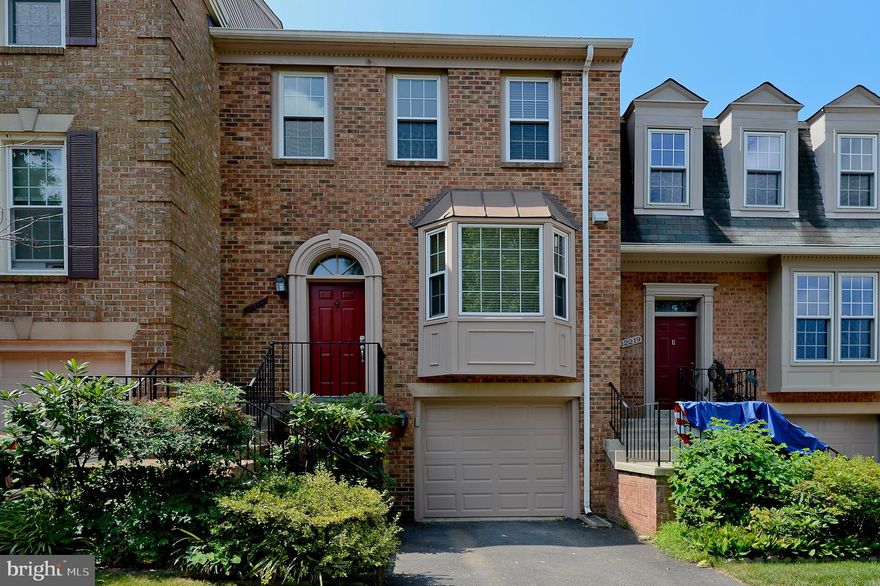 Beautiful, 3 level garage townhome with walkout basement. Flooded with natural light, updated kitchen with newer appliances, cabinets and granite countertops.  Hardwood flooring in the separate dining room and living room. Newer windows, sliders and carpets.  New flooring in the hallway bathroom, main level powder room and basement bathroom. UV air purification system installed in 2020. Bright master bedroom has vaulted ceilings. 2 additional bedrooms on the upper level. Large deck, walkout basement with fireplace, fenced backyard with another deck. Close to Fair Oaks Mall, Fair Lakes Shopping Center, Safeway, Wegman's, Harris Teeter, Wholefoods and Fairfax County Government Center. Conveniently located near major routes: RT 50, I-66 Fairfax County PKWY, RT 29, Metro Bus and Dulles Airport. Easy commute to DC with proximity to I-66. Community amenities include Basketball Court, Tennis Court and Walking Trails. Enjoy the Community Pool and Club House.