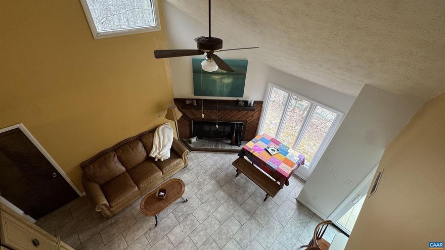 This is a rare end unit Laurelwood top 2 floors with the additional side living space which is currently in use as a 3rd bedroom.  Nice view into the Black Rock Village and adjacent nature area.  Laurelwood is within easy walking distance to skiing and the restaurants, market and other amenities of Black Rock Village. Floorplan available on request.,Fireplace in Living Room