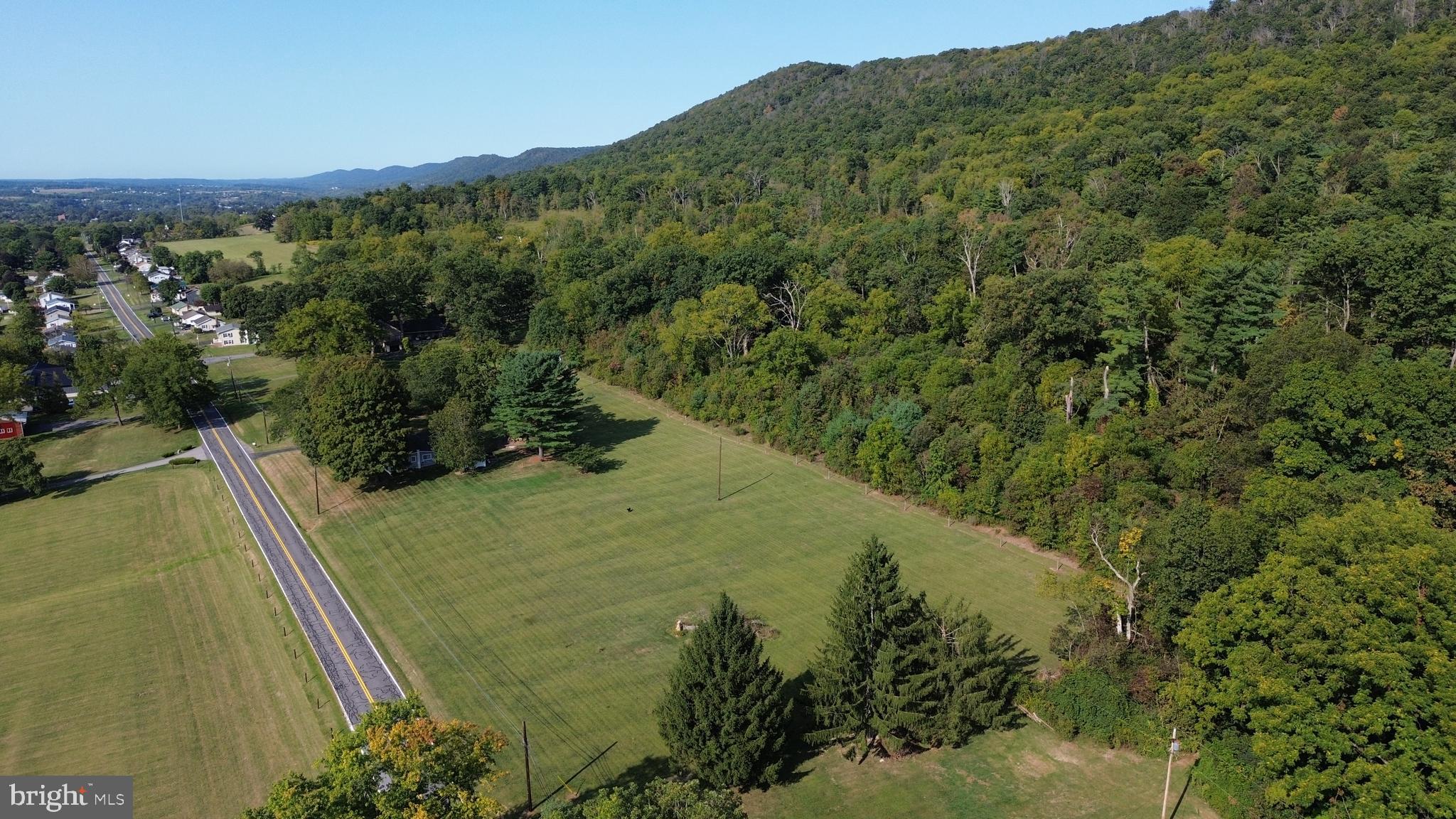 Two prime building lots in the Bellefonte Area School District, each offering scenic views of neighboring farm fields and distant mountain ranges. Lot #1 consists of 1.033 acres and Lot #2 consists of 1.041 acres, providing spacious settings to build your dream home in a peaceful country location just five minutes from downtown Historic Bellefonte. With no restrictive covenants and the flexibility to choose your own builder, these parcels offer creative freedom and rural charm. Both lots are perced for sandmound septic systems; buyer is responsible for installation of the septic system and well, including all associated costs and permits. This is a rare opportunity to enjoy tranquil surroundings with convenient access to schools, shops, and local amenities. Taxes & Land Assessment Value to be determined.