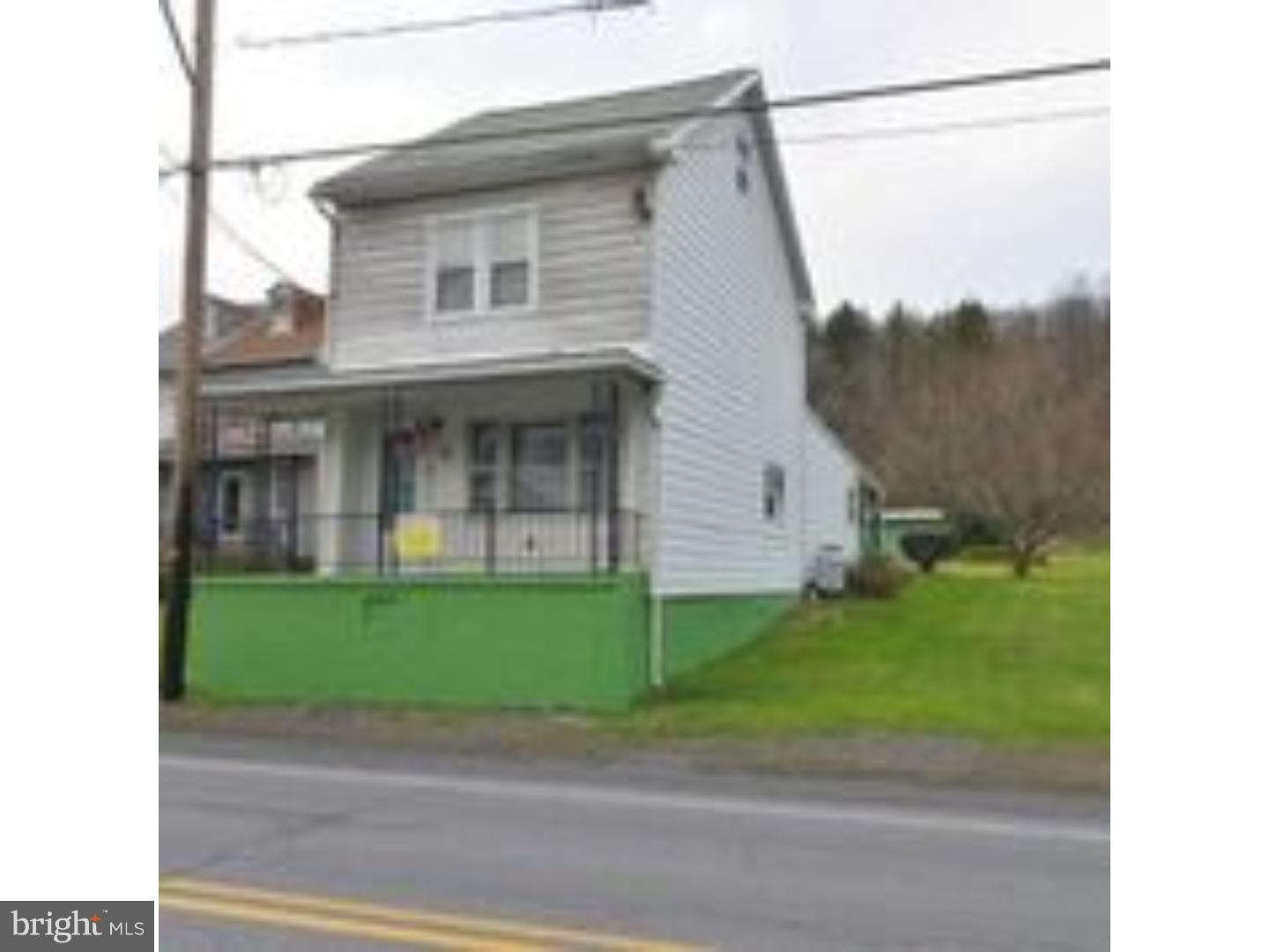Detached home with 2 extra lots in the rear. Taxes are for all parcels. Addresses are as follows 321 ,319 and 323 Main,and 2 lots in rear on O Growler street-roof 2006-mostly newer windows-electric heat with propane for supplement heat-mud room-eat in kitchen-refrigerator 2014-laundry area in kitchen-pantry-furniture may stay if desired-modern bath-very large yard with storage shed.- Covered Patio-Carport- the stove, refrigerator, washer and dryer stay.Additional off street parking.To show house please enter by the street behind the house.