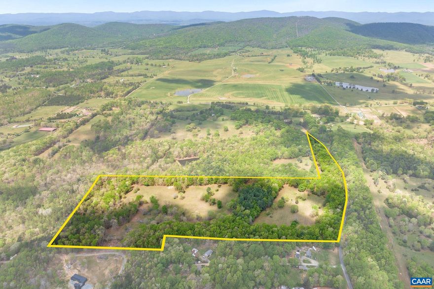 Rare opportunity to own a beautiful estate parcel in the heart of Keswick surrounded by protected farms and estates, and offering the perfect mix of open, rolling pasture bordered by privacy-enhancing hardwood forest. Located just minutes from historic Gordonsville, and less than 30 minutes to Downtown Charlottesville, this wonderful property offers the ideal setting for those looking for convenient amenities, excellent vineyards, & all that Charlottesville has to offer.   There are 5 theoretical division rights, but the land is in Ag Forestal until early 2033.