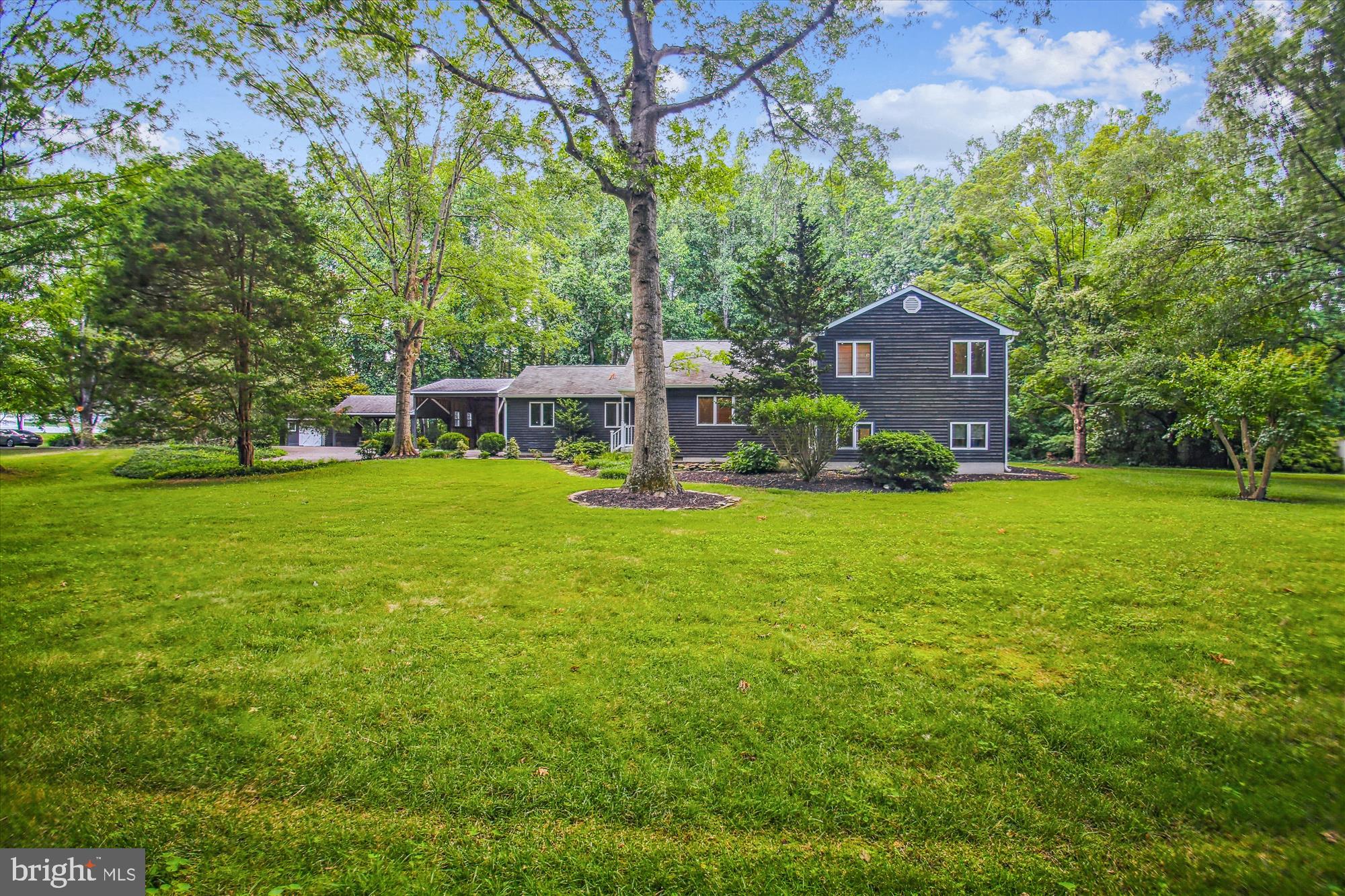 Located on over 2 acres, this ONE OF A KIND home blends Country/Farm/and Contemporary Styles for the most unique homestead! MOVE IN READY! The sellers have updated and prepared this home for total enjoyment for the next family. The uniqueness of the private location, sprawling 2+ acres, pool for family enjoyment, and outbuildings, makes this home ONE OF A KIND! This home features an upper bedroom level with 3 bedrooms and 3 full bathrooms. Two bedrooms have private en-suites, including a Primary Bedroom with a walk-in closet and another en-suite Bedroom. The main level features an Open-Concept Living Room, Dining Room, and Kitchen with a casual dining space. Lower Level offers a walkout slider to the pool area, an Oversized Family Room, a 4th Bedroom, an Office/Den, and a Laundry Room. Located just off of Bacon Ridge Rd, this one lane road leads directly to a serene estate that will take your breath away! Located close by are the Bacon Ridge Bike Trail and the Bacon Ridge Natural Areas. And a short ride to downtown Annapolis!