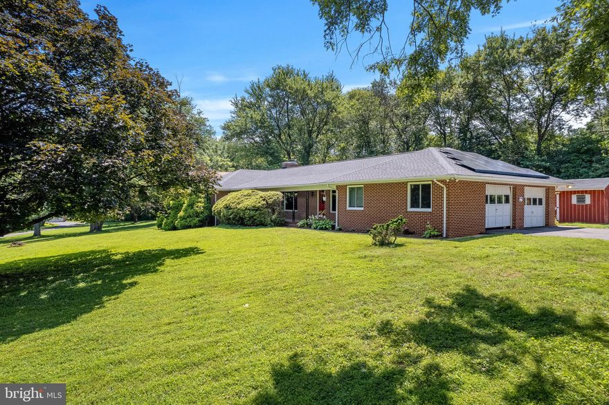 Hard To Find All Brick 4BR 3 BA Rancher On 1.35 Acre Lot, with mature trees and professional landscaping. Oversized 2 Car - Side Entry Garage. NORTH FACING, Perfect home for large private family, multi-generational living, and/or investment property. Formal Living Room and Dining Room; Family Room with Cozy Wood Fireplace. Beautiful hardwood floors on main level. Kitchen has Breakfast Bar, as well as Large Separate Eating Area. And, second fully equipped kitchen in lower level, along with Rec Room, 4th Bedroom & Full Bathroom! Quality built home with all major component upgrades: Brand new HVAC; New Roof (Architectual Shingles) w/New Solar Panels (2024/2025); All new energy efficient windows (2024/2025); New Hot Water Heater (2024/2025). Also, new LVP Flooring throughout lower level, fresh paint. Great Columbia location with all of the amenities (schools, shopping, restaurants, entertainment & recreation) - But, with no associated CPRA or HOA!