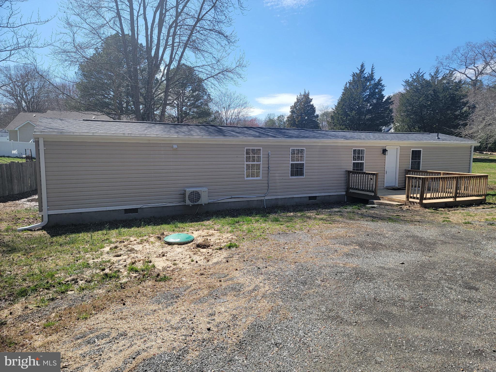 Experience the perfect blend of comfort and convenience in this charming 2-bedroom, 1.5-bath modular home, offering 930 sq ft of well-designed living space. Nestled on a generous .34-acre lot with no HOA restrictions, this property features a spacious kitchen, inviting living room, and a practical laundry room, making it ideal for modern living. Enjoy the freedom of outdoor space while being just moments away from local amenities. Don't miss out on this exceptional opportunity! Could be USDA eligible.