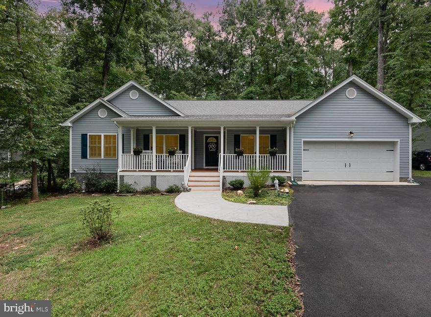 Welcome to 105 Monticello Circle, a beautiful built 2020 home w/over 2100 square feet of living space for you to call home! This 4-year young home is located in the amenity-rich community of Lake of the Woods. This 3BR/2BA home features a split bedroom floor plan that ensures privacy & convenience for all. This home was thoughtfully designed to provide main level living & enjoyment. When you step inside the door, you'll be greeted by Luxury Vinyl Plank Flooring that extends throughout the main areas of the home which adds warmth and sophistication, combining durability with style. The Formal Dining Room & Office/Study, or sitting room are completed with Crown Molding and Plantation Shutters. Step into the warm and inviting Family Room w/Cathedral Ceiling and a cozy Corner Raised Hearth Gas Fireplace w/blower which makes this space perfect for relaxing or entertaining guests. Double French Doors lead out to a deck for more entertaining space. The heart of every home is the Kitchen, which offers beautiful Granite Counters & Tile Backsplash, LVP Tile, 42” cabinets w/soft close doors w/pullout drawers for storage, 60/40 double bowl sink w/motion sense faucet & Recessed LED Lights & Pendant Lights, Smooth Top Electric Stove & Double door pantry, makes preparing a meal for one or hosting a gathering an enjoyable experience. There's room for everyone, add  Bar Stools to the Breakfast Bar & a small table in the breakfast nook. The Screen porch off the breakfast nook expands your entertainment options, offering a serene escape to enjoy the outdoors throughout the year, whether you're enjoying morning coffee or your favorite beverage, or gathering with loved ones. The Screen Porch leads to a maintenance free deck, ideal for grilling and enjoying the tranquil backyard that overlooks a private retreat that backs to Parkland. The Primary Bedroom which is 19’ x 13’ is a peaceful retreat w/LVP Tile which features space for a King or Queen Bed &  a cozy seating area with His & Her Closets. The Primary Bedroom & EnSite have Handi-cap accessible door openings. The primary suite includes 42” Double Bowl Vanity, Elongated Toilets, Soaking tub, & Shower w/12 x 12 tiles. This home offers a perfect blend of comfort & style with the split bedroom feature, your guests can enjoy their privacy, two guest bedrooms with LVP Flooring, double door closets, and Plantation Shutters. The Guest Bath has 42” vanity, elongated toilet, tub/shower. All windows have plantation shutters. There is a covered, rocking chair front porch, a two-car garage, a paved driveway, stamped concrete walkway, and a custom built 10 x 9 shed for extra storage space. Gutter Guards & Conditioned Crawl Space complete this home. 
Lake of the Woods is 550-acre lake that offers fishing, water sports, & lakeside relaxation. 18-hole PGA course. The Equestrian Center offers  riding trails, stables & a riding ring. Enjoy a meal on the clubhouse deck while taking in the sunset and watching boats pass by. There are two lakes - Main Lake and Keaton Lake, Main lake has 2 marinas, 7 lake access areas, and 8 sand beaches. A Pro Shop and Fairways Café, 2 outdoor swimming pools, tennis courts, campground, Clubhouse with food service and space for social and community events, a fitness center & numerous parks with ball fields (3 youth soccer fields &  a lighted baseball/softball field), basketball courts, tot lots  & walking paths. As a private, gated community,   Lake of the Woods provides contracted security services 24 hours a day year-round. A Volunteer Fire & Rescue Company that provides round the clock fire & medical transport services. Lake of the Woods is more than just a community; Lake of the Woods isn't just a place to live; it's a vibrant community, promising unforgettable activity! E-Z commute to surrounding areas, make this the perfect place to call home. This home offers both sophistication & ease of enjoyment, don’t miss the chance to make this your forever home!