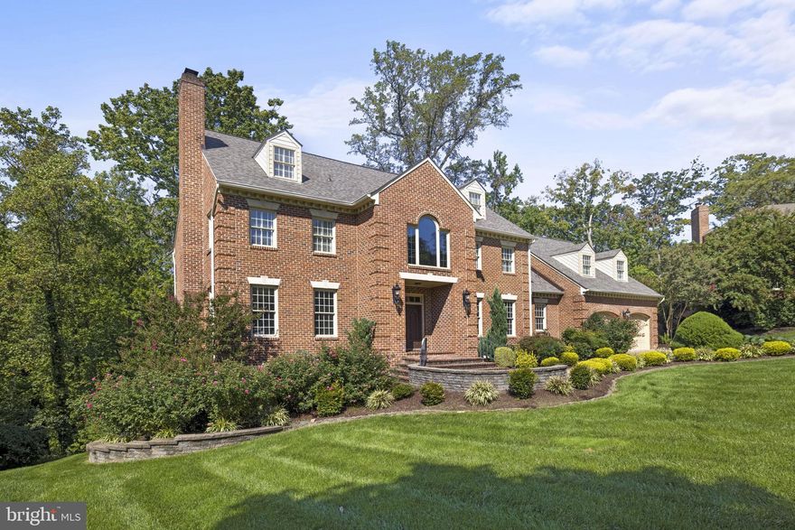 Elegant Living with Waterfront Views in Alexandria! The coveted Belle Rive neighborhood is home to this 6-bedroom, 5.5-bathroom federal colonial-style, one-of-a-kind residence situated near the banks of the Potomac River on a quiet cul-de-sac. In fact, it rests upon and is officially registered as part of the Five Farms of Mount Vernon, the estate of the first president, George Washington. No expense was spared in creating the ultimate dream home: an all-Viking appliance chef’s kitchen featuring a breakfast room, a family room with dramatic coffered ceilings and limestone-clad fireplace, and a sprawling, light-drenched master suite with seemingly endless walk-in closet space. The lower-level features a home gym, wine cellar, rec room with billiards, and home theater area with full bar and temperature-controlled beverage storage. The well-appointed grounds hug the residence with manicured landscaping and old growth trees cast just the right amount of shade year-round for dining al fresco on the home’s tiered outdoor decks. Hosting friends and family for a special event or the holidays? Fear not…the home’s two indoor garage spaces and vast driveway will provide plenty of room for your vehicles as well as your guests. Residents of the community can also enjoy swimming, tennis, and social events by joining the close-by Mansion House Club. The Belle Rive neighborhood is located in Mount Vernon and provides easy access to George Washington's Mount Vernon Estate, Mount Vernon Yacht Club, shopping, restaurants, and schools. All the charm of quiet, countryside living with lightning-quick proximity to all that the DMV has to offer!