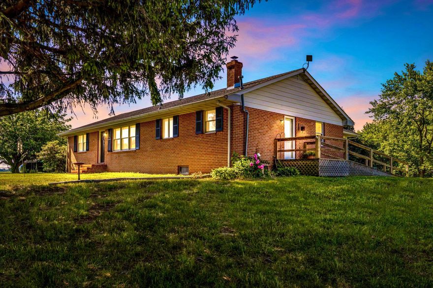 Welcome to 24295 Langford Road in Chestertown, Maryland—a rare opportunity to own a peaceful slice of the countryside on 2 beautiful acres surrounded by farmland.

Just minutes from downtown Chestertown, this property offers the perfect balance of privacy and convenience. If you’ve been searching for a home away from the hustle and bustle, this is the one.

The classic brick rancher features over 1,800 square feet of living space with a full, unfinished basement offering endless potential for storage, a workshop, or future expansion. Inside, you’ll find 2 comfortable bedrooms, a small room that could serve as dressing room, den or office, 2.5 baths, along with thoughtful details such as elegant pocket doors that enhance both function and flow. A cedar closet adds a touch of luxury while providing ideal storage for clothing and linens.

A standout feature of the home is the inviting three-season room addition, where you can relax and take in serene views of the backyard and the surrounding natural beauty. Wildlife is abundant—enjoy frequent sightings of deer, eagles, and more right from your own home.

The property also includes a very large outbuilding, ideal for a variety of uses. Whether you’re looking to run a home-based business, pursue hobbies, or simply need space to store vehicles, boats, or equipment, this versatile structure offers incredible flexibility. It could even be finished into the ultimate workspace or creative studio.

With its peaceful setting, generous acreage, and functional features, this property is a unique find in today’s market.