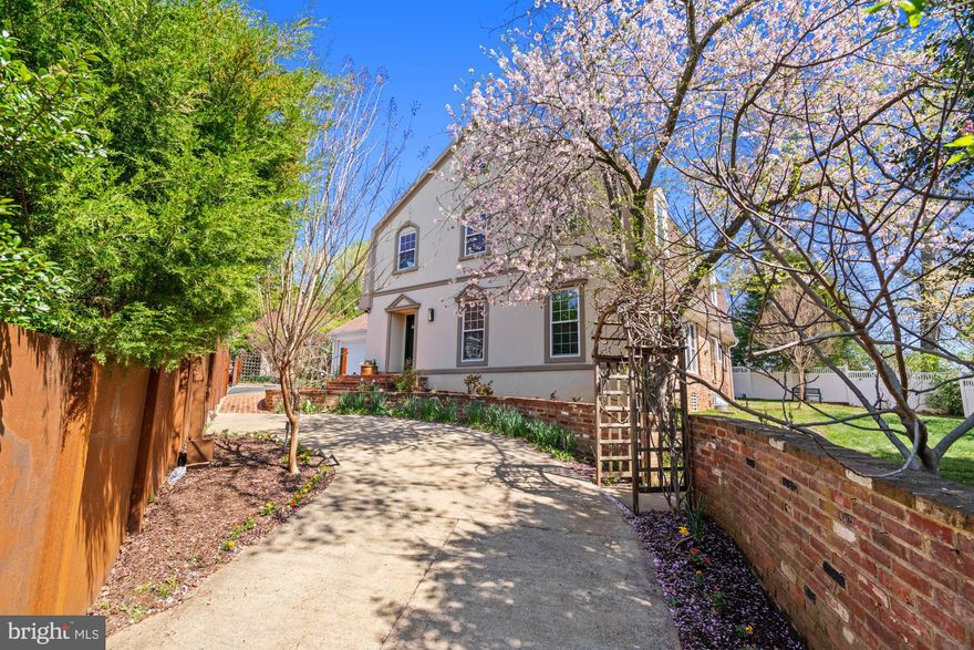 Private Retreat with Pool. Welcome to 6315 Wilson Lane, an elegant home tucked away on a peaceful cul-de-sac, where mature evergreens and fruit-bearing trees create a natural canopy just minutes from everything Bethesda has to offer. This property is a rare blend: serenity and seclusion with unbeatable proximity to schools (Whitman, Landon, Pyle, Burning Tree), downtown Bethesda, Glen Echo, and the Potomac River’s towpath trails.

FOR THE OPEN HOUSE - PARK ON THE WILSON SERVICE ROAD ACROSS FROM DRIVEWAY. OR IN PYLE PARKING LOT - ONLY ON WEEKENDS AND FOLLOW SIGNS AND PLACARDS FOR PARKING SLOTS.

An elegant take on the Dutch Colonial style, this updated genuine stucco facade home pairs soft European lines with a hint of whimsy. It spans approximately 4,800 square feet across three finished levels, with an intuitive layout and generous room proportions rarely found in the area. Every space, from the gracious formal living and dining rooms to the sunlit breakfast nook and inviting family room with a floor-to-ceiling stone fireplace, feels expansive yet connected.

The eat-in kitchen is designed with whimsical refinement - extremely functional with stainless appliances, a breakfast bar, and additional table space flanked by oversized windows. Sliding glass doors open from the connected family room to an expansive and thoughtfully laid out back patio and yard - ready for everything from casual cookouts to grand affairs.  The freeform heated swimming pool, along with the five-person hot tub, and skylit pool cabana offer the ultimate indoor-outdoor lifestyle.  The two car garage connects to the living space via a mudroom with built in storage cabinets, and features a sitting area, hooks, making it easy to organize coats, shoes, and gear. Durable porcelain tiles ensure effortless maintenance. The grassy lawn with mature flowering and fruit-bearing trees line the yard to create a true escape.

On the upper level, the oversized primary suite features hardwood flooring, a large walk-in closet; and spa-like bath with a whirlpool tub, dual vanities, and heated towel racks. Three additional bedrooms, another full bath, and cedar closet complete the second level. 

The finished lower level is all upside. Want a full in-law suite? Sure! How about a multi-media room with room for surround sound? Done! Home gym? Go for it.  The large rec room features high ceilings, an updated full bath, wine cellar, laundry, and storage. The space is ready for your future formal guest suite or anything else you imagine.

An unfinished attic and a bonus space above the two-car garage offer even more flexibility for future studios or storage.

Surrounded by fruit trees, including figs, persimmons, cherries, and plums ripening in the summer sun, this property is more than just beautiful. It is functional, adaptable, and ready to grow with you. With ample off-street parking, a mudroom, and easy evening and weekend overflow parking at nearby middle school, entertaining is a breeze.

6315 Wilson Lane is a brilliant marriage of privacy and convenience, offering peaceful escape without ever sacrificing access. Spacious, sunlit, and move-in ready, this is Bethesda living at its very best.