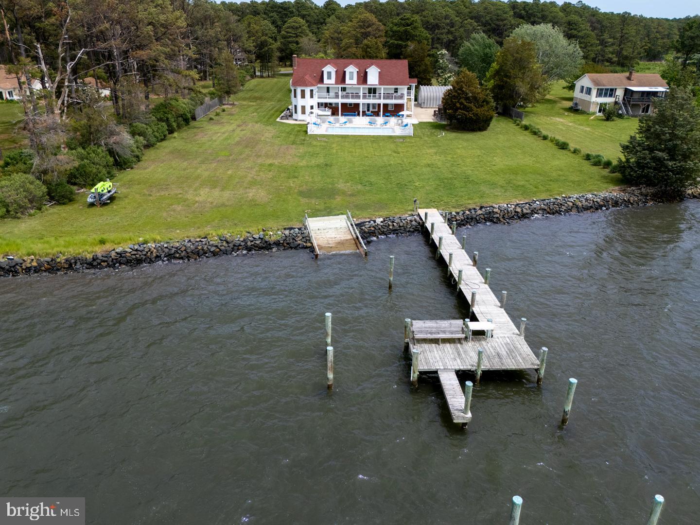 Welcome to Captain's Quarters on the Bay, an extraordinary 3+/- Acre waterfront Estate overlooking the Little Choptank River with direct access to the Chesapeake Bay. Just moments to downtown Downtown Cambridge, fine dining, shopping, and entertainment, this stunning waterfront home offers 5780+/- sq. ft. of three-story living designed for endless indoor/outdoor entertainment and sunset/water views. Inside the home offers deluxe living complete with designer furnishings, large wrap around covered porches, with awesome water and sunset views. Two kitchens, one downstairs for poolside service and a new Gourmet Kitchen on the main living floor offering a large flat top stove, triple ovens, under the counter ice maker and 2 dishwashers for making great family meals. A large Rec-room with large screen TV, games, air hockey, XBOX360 and pool table provides space for everyone. One full bath off the family room provides easy access to the pool area. Outside of the home enjoys a fenced gunite pool w/expansive covered patio, gazebo, paver-lined walkways, pool closet for pool toys, and large garage for lawn equipment and extra storage. A private dock with kayak ramp and stand close by, year round hot tub, basketball court, shuffle board, splinter free playground, large manicured waterfront lawn with a horse shoe pit, double fireplace, built in charcoal grills, and outdoor fire pit make for great outdoor activities for all ages. Finally, for the hunting enthusiast, there is a licensed off shore blind with room for you and your friends to enjoy the great outdoors. With 7 Bedrooms and 6.5 Baths, bring your family and friends to enjoy all the indoor/outdoor activites the Eastern Shore has to offer.
The world renown Hyatt Regency waterfront golf course is less than 7 miles away and is open to the public.