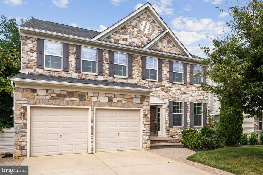 **GREAT NEW PRICE**  OPEN SAT (9/30) from 12-2!! Welcome to 810 Moran Drive in the desirable Monticello neighborhood in Annapolis! This beautiful property seamlessly combines location, space, and natural beauty, creating a haven you'll cherish. With 4 bedrooms and 3.5 baths, this home boasts a spacious layout with high ceilings and an open floor plan spanning almost 4,000 square feet. Abundant natural light fills the space, creating a warm and inviting ambiance. Step inside to discover a captivating two-story great room with expansive windows, a main level office, half bath, and formal dining room. The chef's kitchen with modern appliances and a large marble-topped island opens to a generously sized family room featuring a cozy gas fireplace. Outdoor living is a delight with a deck offering scenic views and easy access to a hardscape patio boasting a charming fire pit. The lush yard backing to nature provides a serene private retreat. Upstairs, find 4 bedrooms and 3 baths, including a spacious owner's suite designed for comfort. The finished lower level offers more space, a walkout, ample storage, and endless possibilities. Practical features include a 2-car garage with epoxy floors, hassle-free HOA-covered irrigation and lawn service. This home is move-in ready, freshly painted, and features newer carpet with an exterior pressure wash and deep clean. Enjoy the community pool, clubhouse, walking trails, and dog park for a resort-like lifestyle. Conveniently situated near Westfield Mall, downtown Annapolis, and the US Naval Academy, with easy access to Route 50, shopping, dining, and entertainment are always close by. Join us for an open house on Sunday, 8/24, from 1-4PM to experience the beauty and comfort of this home firsthand. Don't miss your chance to make this your forever home. Explore the 3D tour on the property site or contact us today for a personal showing!