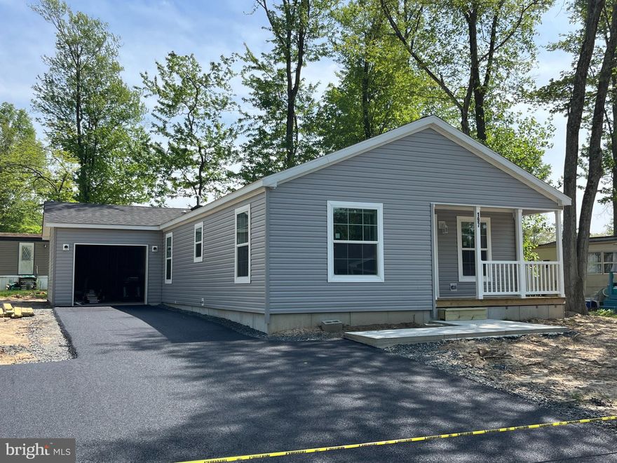 Amazing new home ready to go. This open plan features everything you need in one floor living. The kitchen is perfect featuring stainless steel appliances and lots of counter space. With three big bedrooms, and two full baths say goodbye to waiting to get ready for work. Why rent when you can own this beautiful new home. The home is completed and features a 12 x 24 attached garage.  Gutters and downspouts, new driveway, steps and sidewalks. Central air and more. See this home today. 30 to 60 day closing is available if needed…….