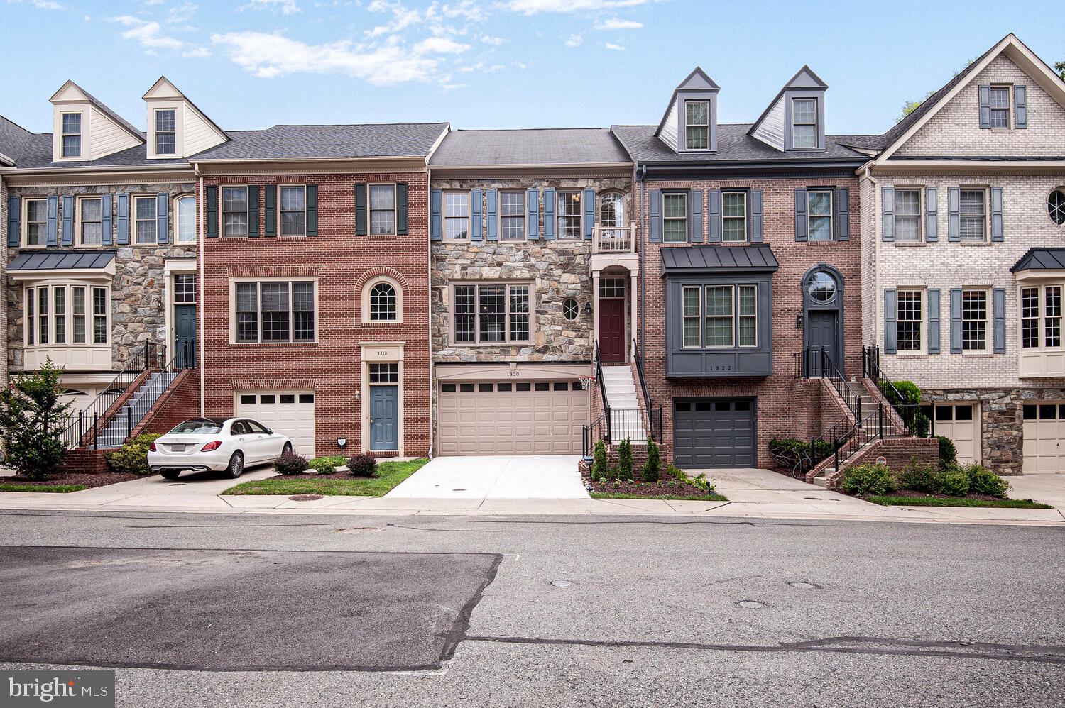 Imagine yourself in this breathtaking stone-front townhome located in the highly sought-after Villages of Tower Oaks community, where luxury meets comfort and convenience! With 3 spacious bedrooms, 2 full baths, and 2 half baths, this light-filled, three-level townhouse is designed for modern living while offering a perfect blend of traditional charm and contemporary open-concept flow.
Step inside and be captivated by the soaring 9-foot ceilings and elegant hardwood floors that greet you. The main level is perfect for both entertaining and everyday living, featuring a formal dining room and a kitchen equipped with sleek stainless steel appliances. The kitchen effortlessly flows into a generous living room adorned with oversized windows, allowing natural light to flood the space. From here, step out onto your expansive Trex Deck, ideal for indoor/outdoor gatherings or simply enjoying a peaceful evening under the stars.
As you ascend to the upper level, you’ll discover the spacious primary bedroom, complete with vaulted ceilings and a walk-in closet. Indulge in your very own en-suite bath, featuring double vanities, a soothing soaking tub, and a separate tiled shower, your personal oasis for relaxation. Two additional bedrooms, also with vaulted ceilings, a full hall bath, and a dedicated laundry area to round out this level, providing ample space for family or guests.
Make your way to the lower level, where a recreation room awaits, featuring a cozy gas fireplace, perfect for movie nights or game days. This level also includes a convenient half bath and direct access to the back patio and your expansive two-car garage.
But that’s not all! This home conveniently backs to Dogwood Park, allowing you to enjoy nature right at your doorstep. You’ll be just minutes away from I-270/I-495, Clyde's, Pike & Rose, Park Potomac, Rockville Town Center, and a plethora of dining, shopping, and community events.
Don't miss out on the opportunity to make this stunning townhome your own, where every detail is designed with your lifestyle in mind! Come see it today and envision your new life in the Villages of Tower Oaks!
