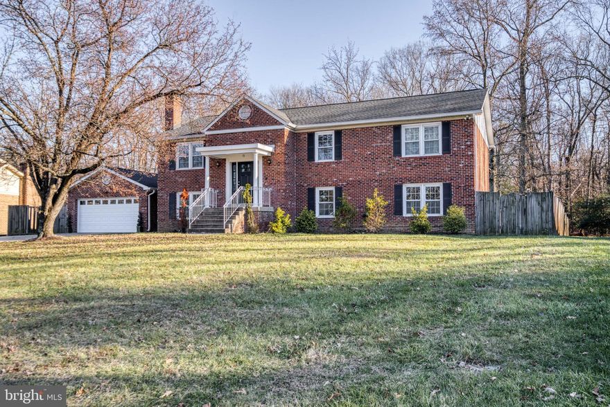 PLEASE CALL LISTING AGENT FOR SHOWING INSTRUCTIONS 240/461-2383.            PRICE REDUCED!!!!!!Fall in love with this beautiful home , featuring 5 bedrooms and 3 full   baths, all new appliances and mechanical systems which were recently replaced. The master bathroom features marble floors  with a huge soaking tub and a frameless shower. There are lots of  closet space throughout. The beautiful kitchen features  granite countertops, upgraded cabinets, coffee bar, and eat- in space area. Step out to a  large deck which overlooks an enormous .50 acres fenced- in back yard. The lower level features  a large family room with  a brick fireplace,  2 bedrooms and full bath. Large two car garage with lots of extra space and is  connected by breezeway. This home is located in the beautiful neighborhood of North Tantallon, conveniently located  near National Harbor, National Golf and Country Club, Fort Washington Park, Short commute to DC and VA.