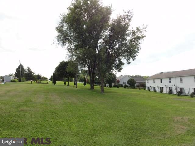 Bring your own builder to this lovely .61 acre lot located in the heart of Millheim. This lot has a wonderful view of the mountain along with public water and sewer. Don't miss this opportunity!