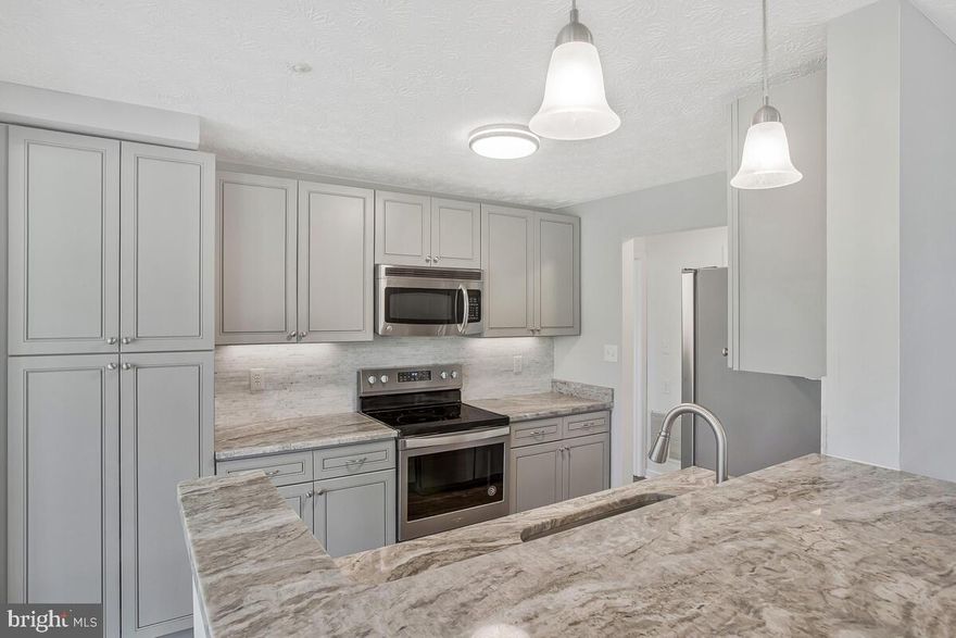 THIS FULLY RENOVATED 2 bedroom 2 full bath home is located in the heart of Piney Orchard walking distance from the community pool, tennis courts, lake , ice rink and shopping center. The fresh tones carried throughout  the home from the kitchen to the bathroom gives you that spa like feel. Your comfort and convenience is already taken care of with the  NEW  HVAC system , WATER HEATER and WINDOWS all installed recently