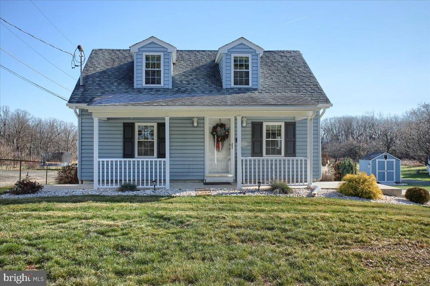 Nestled on 3/4 of an acre, this completely renovated Cape Cod is move in ready.  2 Bed, 2 Bath makes this perfect for a first time homeowner or someone that needs to escape the city life.  All new EVERYTHING built around the original log cabin house.  Recessed lighting in Living room and Dining room.  Primary bedroom on main level with private bath.  Solid oak cabinets in kitchen along with quartz countertops, bead board, chair rail, under cabinets lighting and stainless steel appliances.  All which convey.  Second bedroom and full bath on upper level has double vanity, tub/shower combo and washer and dryer which convey as well.  Basement has shelfing, storage area, dehumidifier, and 2 sump pumps with Bilco doors leading to the back yard.  Water softener, aerator, house filter and UV light installed on well.  Trex deck on side was just replaced this past summer.  Wireless 360 degree security system located on back porch.  Shed with solar lighting inside.  Oversize garage has heat and electric, hanging shelves, front garage door w/ opener and side door.  What a transformation from the original log cabin house.  The transformation of this cute Cape Cod is remarkable and a must see.  Close to interstate, shopping and restaurants.  Call for your showing today!