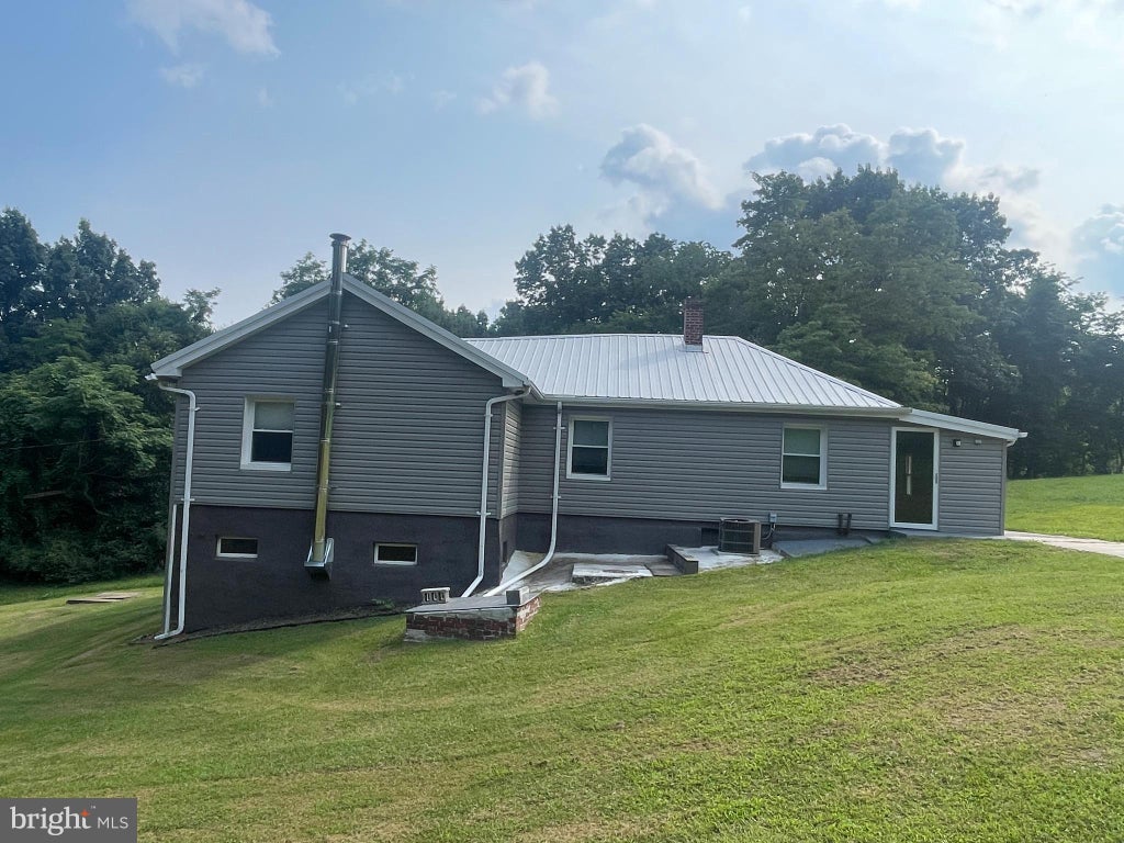 Photo of 13002 Moores Hollow Road SE, CUMBERLAND, MD 21502 (MLS # MDAL2015448)