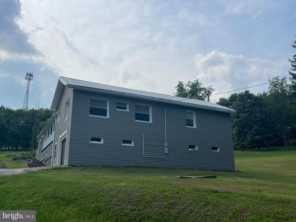 Photo of 13002 Moores Hollow Road SE, CUMBERLAND, MD 21502 (MLS # MDAL2015448)