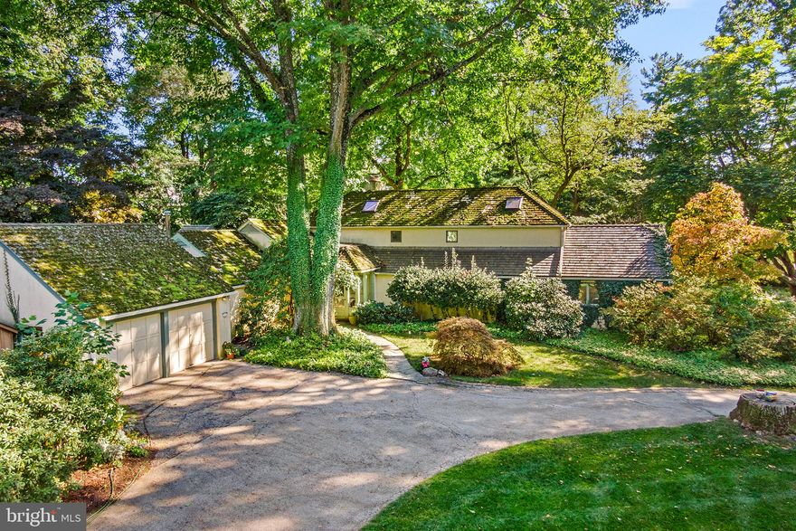 Enjoy a lifestyle wrapped in nature and art on two spectacular acres in the heart of Easttown Twp.  This home features timeless quality construction.  Built in 1948 this thoughtfully designed architectural home is one-of-a-kind.   Most rooms open to the outside or offer large windows with impressive lawn and garden views from every angle. This mid-century modern design features one-and-a-half floors of living.  Enter the large vestibule via flagstone walkway and natural wood front door.  The foyer offers a large coat closet and entry to a stunning great room with vaulted ceiling, a gas fireplace, recessed lighting, built-in bookshelves and a large window and French door overlooking the south facing yard.  This room flows perfectly to a large and gracious dining room with built-in bookshelves. Both rooms open to a rear heated sunroom featuring a gas stove, flagstone flooring, built-in bookshelves, recessed lighting, natural light and fantastic landscape/nature views.  The kitchen boasts Corian countertops, a double oven, built-in fridge and a spacious eating area and access to brick patio, an adjacent floored mudroom and attached two car garage.  There is a first-floor powder room as well as a laundry closet. Down a large hallway towards the first floor living quarters, you’ll find two bedrooms each with sliding glass doors to the exterior grounds and a spacious hall bathroom with double vanities.  Further down the hallway is a large first floor office or den with vaulted ceiling, built-in cabinetry and a rear staircase to second floor primary bedroom suite.  This second-floor suite feels as if you are nestled in a treehouse or private nature preserve.   There are several closets, and an ensuite bathroom with double vanities along with a separate tub and shower. Two sets of sliding doors open to a deck overlooking the lush, landscaped grounds.  Additionally, there is a small walk-up attic with utility components.  This luxury property pairs a unique sense of whimsy with quality and comfort at every turn. 328 Beaumont Road is a true oasis enveloping you in the wonders of wildlife and nature.  This property is walkable to the Waterloo Mill Preserve (170 acres), and Hilltop Park.   It is conveniently located close to Devon Yards and all major routes of transportation.    This home is being sold as-is and offers great bones for those ready to take it to the next level.   Simply put, this is a terrific opportunity in a A+ location.