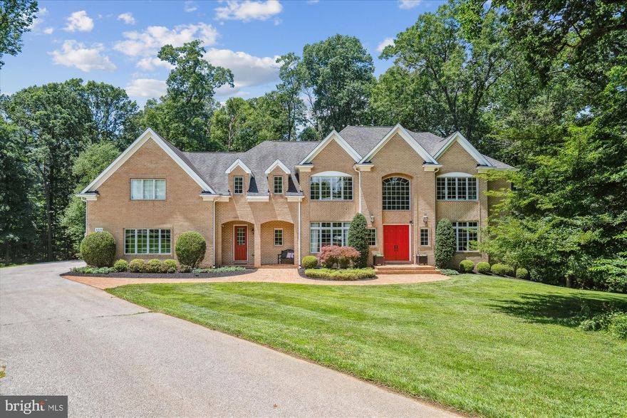 THIS ABSOLUTELY STUNNING CUSTOM  BUILT ALL BRICK ESTATE WILL TAKE YOUR BREATH AWAY SERENELY SITUATED ON 5+ ACRES SURROUNDED BY DESIGNATED FOREST PRESERVATION LAND THIS PRIVATE RETREAT FEATURING NEARLY 9,000 SQ FT  CONVENIENTLY LOCATED IN CHARMING HIGHLAND GIVES YOU THE BEST OF BOTH WORLDS - THE ULTIMATE IN WOODED PRIVACY WITH ALL THE BENEFITS OF A NEIGHBORHOOD COMMUNITY  THE SOARING TWO STORY GRAND FOYER WELCOMES YOU TO AN OPEN FLOWING FLOOR PLAN IDEAL FOR GRACIOUS ENTERTAINING OR CASUALLY RELAXING WITH FAMILY AND FRIENDS  FEATURING 5+ BEDROOMS WITH A PRIMARY BEDROOM SUITE ON THE MAIN LEVEL 5.5 BATHS FULLY FINISHED WALK OUT BASEMENT WITH TREMENDOUS RECREATION ROOM AND EXPANSIVE OFFICE AREA  WITH SEPARATE PRIVATE ENTRANCE ALLOWS FOR FLEXIBLE USE EXPANSIVE FLAGSTONE PATIO WITH COVERED SITTING AREA OFF OF EXCEPTIONALLY WELL DESIGNED KITCHEN WITH GRANITE COUNTERTOPS THAT GO ON FOREVER HIGH END APPLIANCES & CENTER ISLAND PREP SINK 3 CAR GARAGE CUSTOM FIRE SPRINKLER SYSTEM AND SO MUCH MORE YOU DON'T WANT TO WAIT TO SEE IT SALE INCLUDES SEPARATE FOREST PRESERVATION PARCEL DESCRIBED AS DEANMAR DR  CONSISTING OF 3.43 ACRES (NON BUILDABLE) FOR A TOTAL OF 5+ ACRES TO CONVEY  SEE DOCUMENTS FOR LOT DESCRIPTION PLAT        Note:  Public Records  2007 Sale Amount of $500,000 was for land only, prior to construction