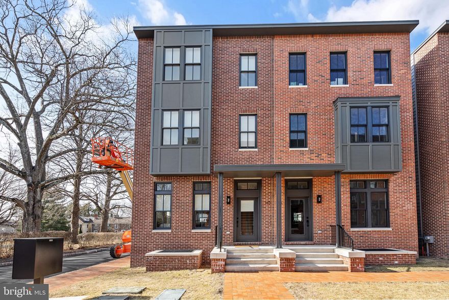 Welcome to Court & State, Newtown Borough’s only luxury townhouse community, ideally located along the charming and vibrant corridor of 215 S. State Street. This exclusive collection of just 12 artisan-designed residences blends modern sophistication with timeless historic charm, offering one of the last opportunities to live directly within Newtown’s walkable shopping and dining district.

113 Thornton Lane presents a stunning corner brick townhome spanning four thoughtfully designed levels, filled with natural light from large picturesque windows. With 4 bedrooms, 3 full bathrooms, and 1 half bath, plus a fully finished basement, this home offers exceptional flexibility and space for today’s lifestyle.

The main level showcases a bright open-concept floor plan featuring hardwood flooring, high ceilings, and recessed lighting throughout. The modern kitchen is beautifully appointed with quartz countertops, stainless steel appliances, and ample pantry space, flowing seamlessly into the dining area and spacious living room—perfect for entertaining or everyday living.

Upstairs on the second floor, you’ll find two generously sized bedrooms, a designer full bathroom with custom vanity and tile selections, and a convenient laundry room with front-load washer and dryer. An additional bonus room or office provides even more versatility.

The third-floor primary suite is a private retreat, complete with a large walk-in closet and a luxurious five-piece spa-style bathroom featuring a freestanding soaking tub, oversized glass walk-in shower with body sprays and handheld fixtures, and elegant finishes throughout.

The fully finished basement offers additional living space that can easily function as a fourth bedroom, guest suite, recreation room, or home office, along with extra storage.

Additional highlights include:

Two deeded parking spaces directly behind the home

Multi-zone heating and A/C systems

Smart home features including Nest thermostats and Ring security cameras

Energy-efficient and green building amenities

Large windows throughout providing abundant natural light

Located in the heart of Newtown Borough, you’ll enjoy true walkable living with restaurants, cafés, boutiques, brunch spots, and taverns just steps from your door—offering the feel of city living with suburban charm. Outdoor enthusiasts will appreciate being just a short drive from Core Creek Park and Tyler State Park, while commuters benefit from easy access to I-95, the Pennsylvania Turnpike, Philadelphia, NYC, Doylestown, and New Hope.

Opportunities like this are rare—luxury new construction in one of Bucks County’s most desirable and walkable boroughs.

Schedule your private showing today and experience the best of Newtown living.