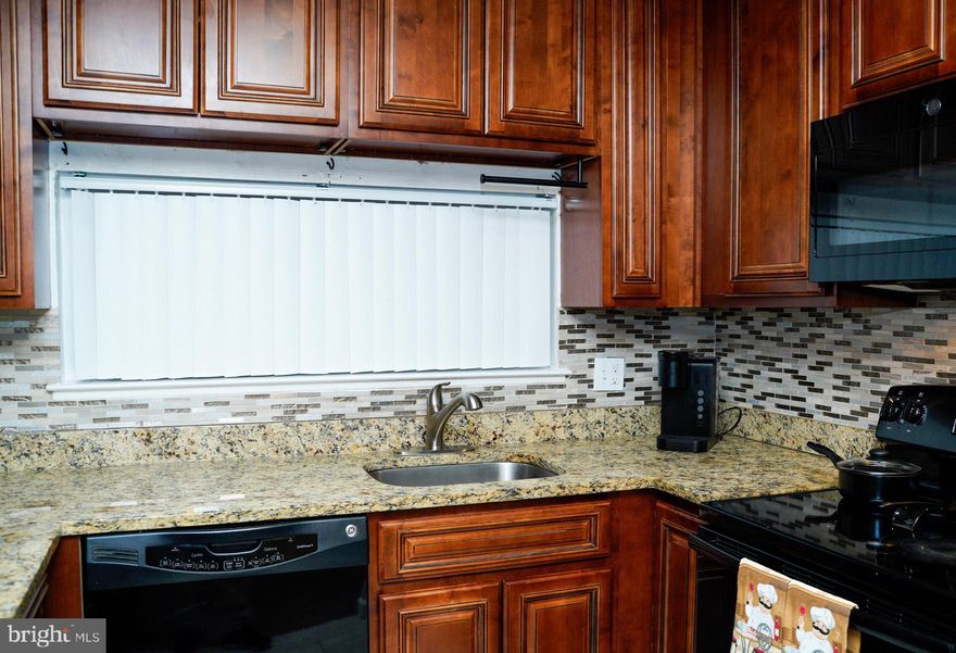 Welcome home to this highly sought after community located in Randallstown.  Recently renovated with fresh paint, upgraded flooring and recessed lighting to make this home a must see. The main level open-concept layout boasts a spacious living room, dining area, with half bathroom and kitchen. Kitchen boasts extensive cabinetry, granite countertops, and more! The second level has 3 bedrooms and 2 full baths with a walk-in closet and en-suite in the primary bedroom. The lower level space is perfect for a home office, media room, space for teenagers, etc. with additional storage area available. Conveniently located near parks, schools, restaurants, and shopping. Schedule your appointment today to see all the beauty and charm this home has to offer.