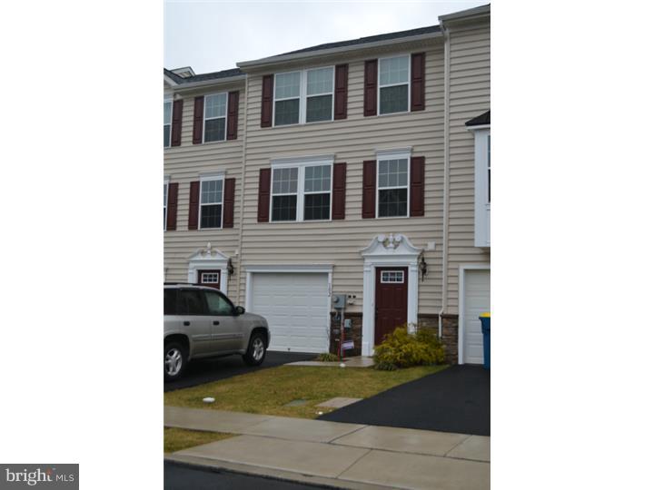 Beautiful Montgomery Township Colonial Townhouse! Like new - Only 3 years old! Come take a look at this beauty! You won't be disappointed! This home features 3 bedrooms with generous sized closets (a walk-in in the master), one & 1/2 baths, full eat-in kitchen, large living room, a basement level laundry room & an unfinished living area that leads to a gorgeous EP Henry paver patio! There is a one car attached garage with a garage door opener & inside access. This unit has its own driveway for parking and an overflow lot. There is also an alarm system, recessed lighting, cathedral ceilings, ceiling fans, & more! This home is close to everything! Easy access to Rt 309, 202, 63, etc. North Penn Schools, too! Reasonable taxes and association fee! The current owner has a very affordable assumable mortgage - call for more details! This home won't last! Call today!!