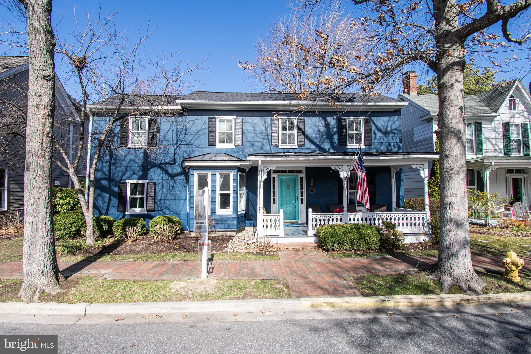 Nestled in the heart of the historic town of St. Michaels, this enchanting 3-bedroom, 2-1/2 baths historic home offers the perfect blend of modern comfort and timeless charm. Do not miss this rare opportunity to own a piece of St. Michaels' rich history. Whether you are seeking a weekend getaway or a forever home, 113 W Chestnut Street is a true gem on one of the most desirable and beautiful streets in St. Michaels. Lined with old trees, historic lanterns and brick sidewalks, West Chestnut Street ends directly at the picturesque waterfront on San Domingo Creek with its covered bridge, park, public dock, and access to St. Michaels Nature Trail. Originally constructed between 1817 and 1855, “The Philemon Adams House” is a well-maintained home with recent updates incl. the roof and exterior paint. This turnkey home boasts an inviting covered front porch, hardwood floors, built-ins, a bright and airy interior, upstairs and downstairs sitting rooms, a generously sized modern kitchen with abundant cabinets next to a large family room, beautiful garden with brick patio and mature plantings. The double lot has rear access from Thompson Alley, a garage with studio and storage above, a covered carport, and additional driveway parking. With a spacious 2,550+ square feet of living space, this property is ideal for those looking to experience the serene Eastern Shore lifestyle and everything St. Michaels has to offer.
