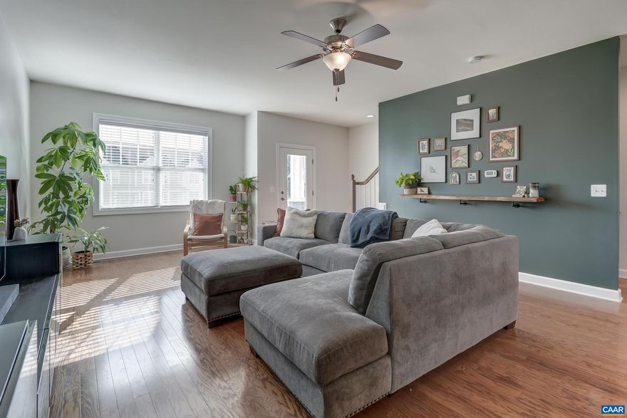 Wow! A spacious, move in ready home in Western Albemarle at a fantastic price! Walk to downtown Crozet and the town center in Old Trail. Fitness center, pool, park and restaurants nearby. This townhouse features an open concept main level, perfect for entertaining and comfortable living.The great room opens to the kitchen with espresso stained cabinets and stainless steel appliances. It also features a custom built-in entertainment unit. Dine in the spacious eat-in dining area or at the large bar in the kitchen. Upstairs, the owners suite offers a quiet retreat, two large closets, and a private bathroom. Two additional bedrooms share full bath. The stacked laundry is upstairs with the bedrooms for your convenience. The daylight ground floor features a fourth bedroom/home office, full bathroom and a 320 sq ft  additional space framed, insulated, heated and wired, ready to create a rec room or in law suite. Great location just outside of Old Trail and a few blocks to all that Crozet offers. Enjoy a low maintenance lifestyle with lawn care provided by HOA and two reserved parking spots right at your back door.  Easy on grade entry into home. A playground for kids and green space for your dogs right outside your front door.,Wood Cabinets