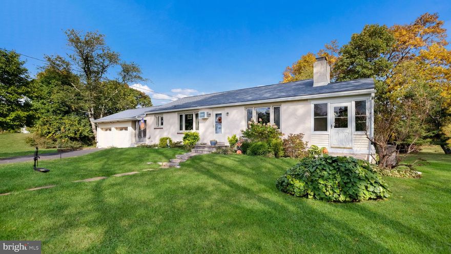 Nestled on a low traffic street, in beautiful Worcester Twp., this sprawling home offers an open floor plan and easy one floor living.  Enjoy your morning coffee while watching the birds from the eat-in kitchen which has front and backyard views.  Keep cozy on cold winter nights with the wood burning fireplace in the spacious living room, which features hardwood floors.  A spacious bedroom, with adjacent full bathroom, on the lower level is great for guest or as an in-law suite.  Step outside through the sliders from the bedroom to your own private patio.  Gardeners will love the side porch to start seeds and to holdover summer plants.  Connecting the oversized, two car garage to the house is an enclosed breeze way.  Located in the award winning Methacton School District, this home includes a newer roof, public sewer, level lot and easy access to KOP.