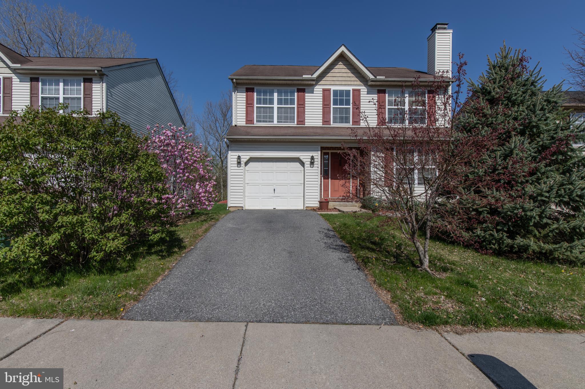 Welcome to 411 Highlands Blvd – a well-maintained Colonial in a peaceful Easton location! This 3-bedroom, 2.5-bath home offers a smart layout and inviting spaces throughout. The main level features beautiful hardwood flooring, a bright and spacious living room with a cozy fireplace, a formal dining area, and a well-sized kitchen with plenty of cabinet space and room to add your own personal touches. Sliding glass doors from the breakfast area lead to a serene backyard—perfect for outdoor relaxation or entertaining. You'll also love the convenience of first-floor laundry and a powder room, thoughtfully tucked away for functionality. Upstairs, the primary suite offers a comfortable retreat, complete with great natural light and its ensuite bath. Two additional bedrooms and a full hall bath provide space for family, guests, or home office needs. Further highlights include a one-car garage, full basement, and a quiet backyard framed by mature trees. Conveniently located near schools, shopping, and commuter routes, this home is full of potential and ready for its next chapter. Don’t miss the opportunity to bring your vision and make this Easton gem your own!