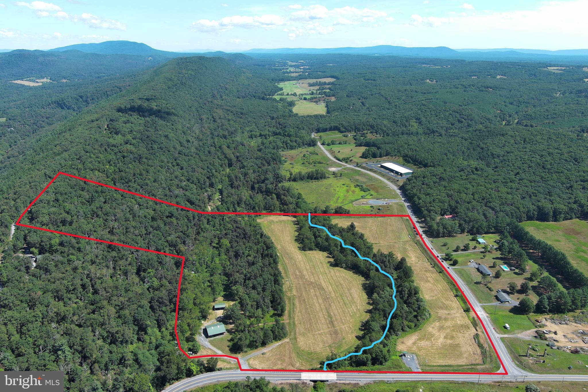 40.955 AC INTERSECTION RT 50 & SMOKEY HOLLOW RD