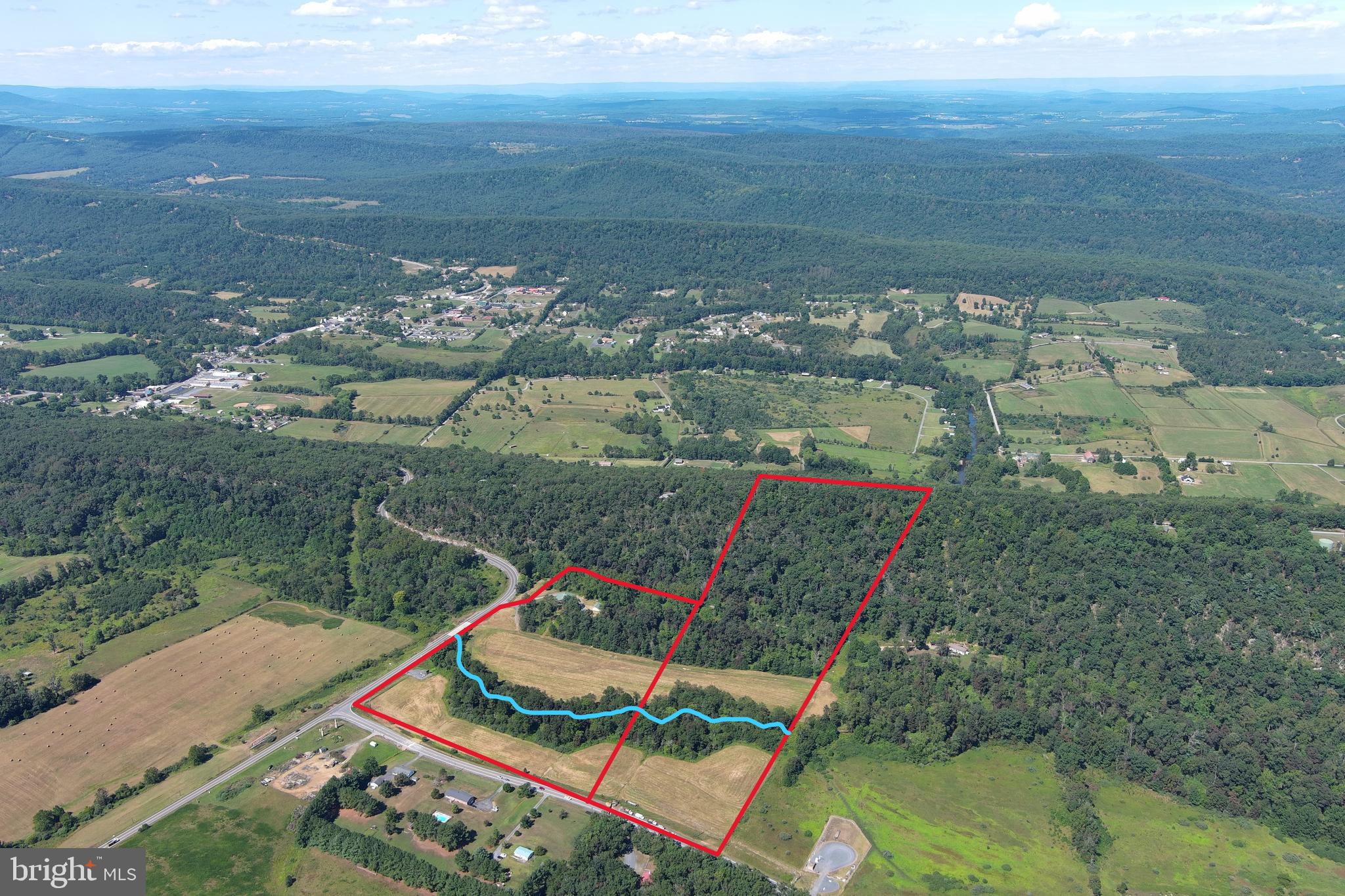 40.955 AC INTERSECTION RT 50 & SMOKEY HOLLOW RD
