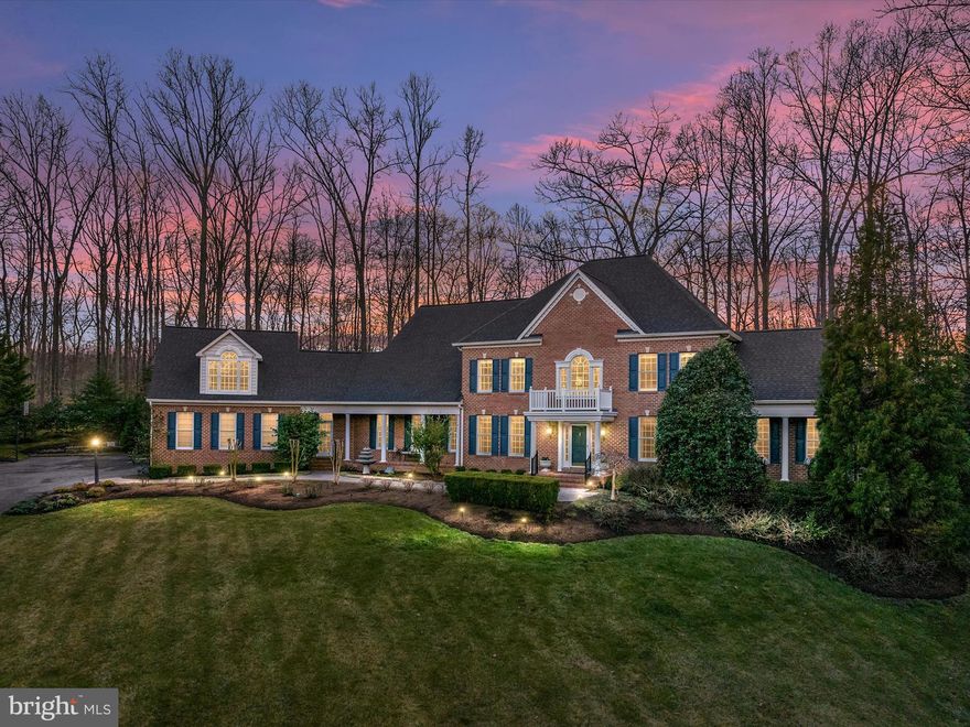 Welcome to this exquisite South River Colony home, where luxury meets tranquility in every detail. This model has many custom-designed features and boasts 8991 total square feet, with 6141 square feet on the main level and an additional 2850 square feet in the basement. Featuring 5 bedrooms, each with its own en-suite bathroom, and multiple home office spaces, this residence offers unparalleled comfort and privacy for discerning homeowners.
Step into the grand foyer and be greeted by the open-concept custom-designed kitchen that seamlessly flows into the family room, creating a perfect space for gatherings and entertaining. Enjoy the warmth of the gas fireplace or retreat to the sunroom with cathedral ceilings, adorned with cork floors for added elegance.
This home is not just a showcase of architectural excellence but also a testament to thoughtful upgrades and meticulous maintenance. From the original enhancements made to the property, such as the finished room over the garage and the custom-designed furniture nooks, to the seller upgrades including an upper-level laundry room, additional windows and doors, and professional landscape design every aspect of this home has been carefully curated for comfort and convenience.
Outdoor living on 2 acres is elevated with the addition of a pond featuring a mesmerizing rock waterfall, complemented by extensive hardscaping, landscape lighting, peaceful fountains, and a screened oval-shaped gazebo. Relax in the serene ambiance of the rear yard, which backs to a conservation area, and potential space for a future pool, offering unparalleled privacy and tranquility.
Practical features abound, including a built-in Generac generator, a water treatment system, and an irrigation system, 4-zoned HVAC, 9-ft ceilings, and a recently replaced roof. With a three-car garage plus additional driveway parking and two laundry rooms, this home effortlessly combines luxury with functionality.
Experience the epitome of luxury living in South River Colony.  The community amenities include  tennis court, basketball court, two pools, swim teams, walking trails and a playground.  Memberships are available for the 18-hole privately owned golf course located in the community.   Don't miss the opportunity to make this exceptional property your own. Schedule a showing today and prepare to be captivated by its timeless charm and impeccable craftsmanship.
Additional features include: Step-down family room, large walk-in pantry, Additional windows and doors added to the rear of the house – 5 points of entry on the rear of the home,  Six burner Jenn-air gas cooktop in center kitchen island, Two dishwashers with cabinet panels, Double wall ovens, Foyer chandelier on motor for lowering and raising for ease of cleaning, French doors, Pre-wired speaker system -  inside and out, Partially finished basement with HVAC, electric, insulated walls and a bathroom rough-in,  Hot tub (2019), Security cameras, Motion detectors, Extensive professional landscaping , Extensive professional hardscaping –paver walkways and patios (refreshed with newer polymer sand in 2023), Landscape lighting, Buried downspouts, Brazilian hardwoods, Newer roof (2021), Playset and recycled rubber base, Retractable awning, and Custom brick mailbox.  SEE VIRTUAL TOURS. Schedule for showings is  11am-7pm