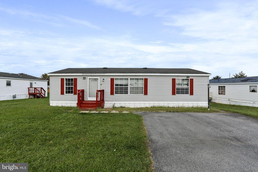 Well-maintained double-wide mobile in the Royal Crest Estates community! Featuring 3 bedrooms, 2 full baths. Luxury vinyl plank and carpet flooring throughout. Living room. Eat-in kitchen with ample cabinetry and table space. Primary bedroom and primary bath with tub shower. Washer/dryer hookups. New storage shed and new HVAC system. Square footage is an estimate and needs to be verified. Home can be moved out of the park. Ground rent of $494/month includes trash and snow removal. Buyer must be approved by park. Application fee is $36 per adult and can be obtained by calling the park. Conveniently located near Route 9, I-81, shopping and dining.