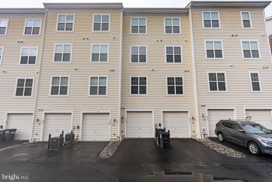 Huge Price Drop!!!!! Welcome home to Lee Square! This brick 2 Level townhome-style condo is gorgeous, with a light-filled, open floorplan and sophisticated primary bedroom suite with 1 Car Garage Plus Concrete Drive Way. Completely Updated. All NEW Flooring on two Levels, Fresh Paint. Beautiful kitchen, boasting rich wooden cabinets, upgraded countertops, recessed lighting and solid hardwood floors With the breakfast bar opening into the dining area, this home is great for entertaining friends and family. All refreshed bathrooms. Hardwood floors have been refinished. On the rear of the home, the one-car garage and driveway provide you with plenty of space for convenient storage and parking. This fantastic location is only half a mile to Old Town Manassas to enjoy live music at First Fridays as you explore downtown! Just minutes to Giant, Harris Teeter, Walmart, Manassas Mall, Bull Run Regional Park, Manassas Park Community Center, Prince William County Fairgrounds, and Manassas Regional Airport. Quick access to Route 28, I-66, Route 29, Liberia Avenue, and the Prince William Parkway allows for ease of travel around Northern Virginia. Schedule a private tour of your beautiful new home today!