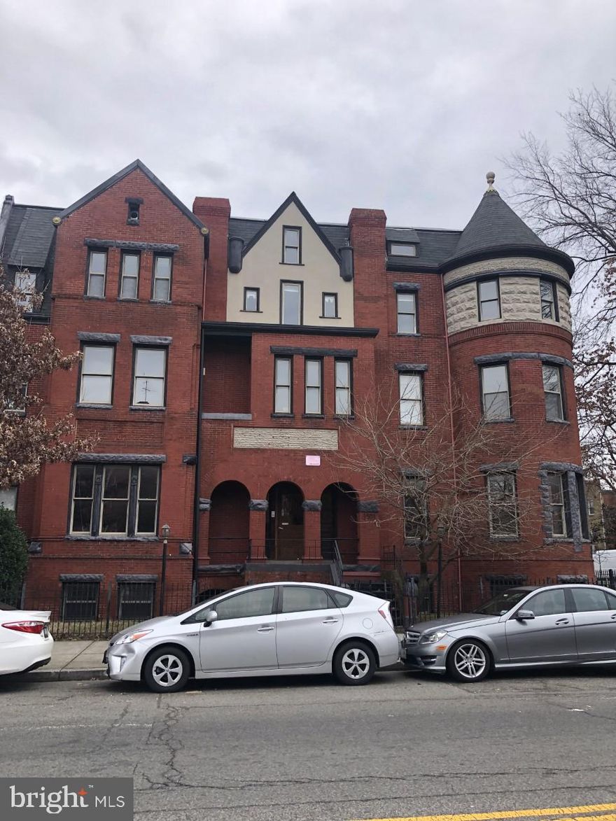 STATELY LOGAN CIRCLE Office Building/Residence (6,213 SQFT per Public Record) which could easily be reimagined.  The space includes 3-Levels with loft area comprised of 4950 SQFT above grade and additional 1,263 SQFT English basement.  

The End Cap Victorian mansion in Historic Shaw fronts 11th Street on a corner lot and has incredible curb appeal,  with character elements in the millwork and masonry, wrought iron exterior entrance stairway, fenced yard, replacement windows, and is fully sprinklered, with three distinct entrance areas, as well as life safety egress.

Built in 1890 this is available For Sale for the first time in decades. The 11th Street corridor was recently effectively UP-ZONED to encourage mixed-use development, specifically commercial and residential on the 11th Street overlay. The District of Columbia has prioritized this property as mixed-use and is taxing it at $22,121 (2022) per annum. It could remain an office/retail building, be converted back to a single family home, or apartments/condominiums or a mix of those uses.

The 2021 Comprehensive Plan Map is enclosed and reflects the new zoning of MU-4 (Mixed-Use) and permits a broad range of commercial, institutional, and multiple dwelling unit residential development.

This sun drenched building, with ample windows to provide natural light throughout, also has three main entry points, and was most recently leased as a multi-tenanted office building. However, this mansion, with six decorative fireplaces can easily be converted back to a single family home or multiple units.

The open floor plan allows for a modern workplace experience with board room and creative space. The parlor areas can be utilized as flex spaces for seminars, receptions, makers space or collaborative meeting space. The building functions very well as an office and can accommodate the around-the-clock work environment, complete with a full bathroom with stand up shower, and additional powder restrooms, kitchen/breakroom, storage, swing space and private rooms/offices.

Proximate to bustling Logan Circle, the site is walking distance to 4 Metro rail stations, various attractions and amenities: libraries, dog parks, skate park, restaurants, entertainment, schools, museums, daycares, hospitals, fire department, colleges, swimming pools, pharmacies, police department and post office.