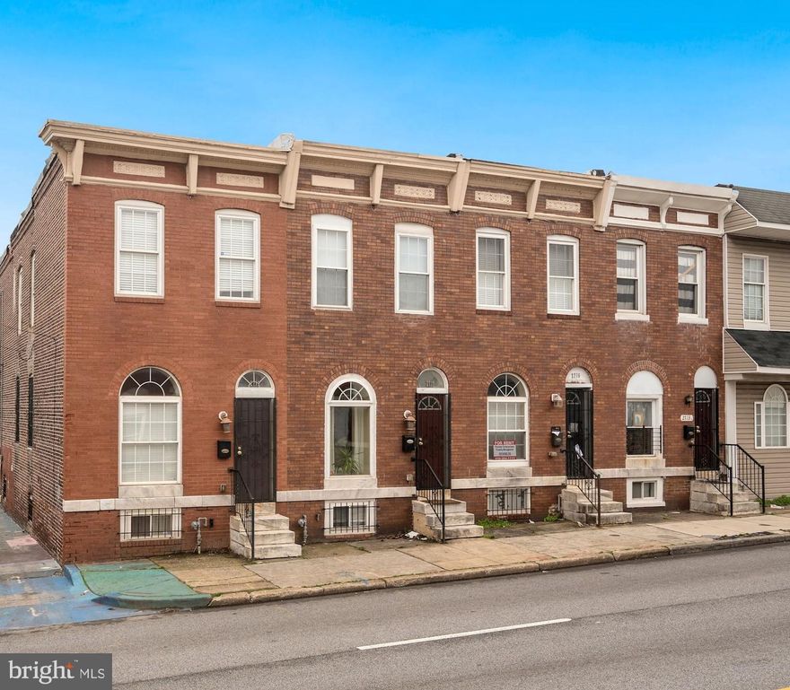 Welcome home to this well maintained end unit townhouse with so much to offer! This home includes: detached garage, hardwood floors, open floor plan, granite countertops,  stainless steel appliances, two   spacious bedrooms on the upper level (walk out deck from primary bedroom), and a finished basement with full bath & 3rd bedroom.   This lovely move-in ready home is located minutes from Patterson Park and Johns Hopkins hospital.