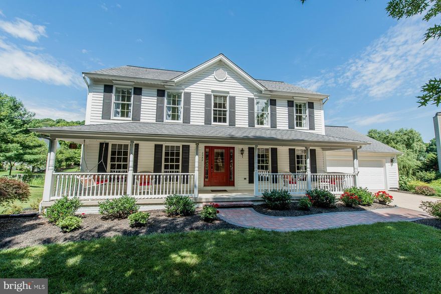 Remarkable property flanked by tall evergreens offers an ideal porch leading into formal living & dining rooms. Kitchen boasts sleek black appliances & granite counters w/access to 2-tiered deck, perfect for entertaining! Family room w/tall ceilings & gas FP. Owner's Suite features cathedral ceilings & luxurious bath. Finished lower level complete w/recreation, games area & storage! A must see!